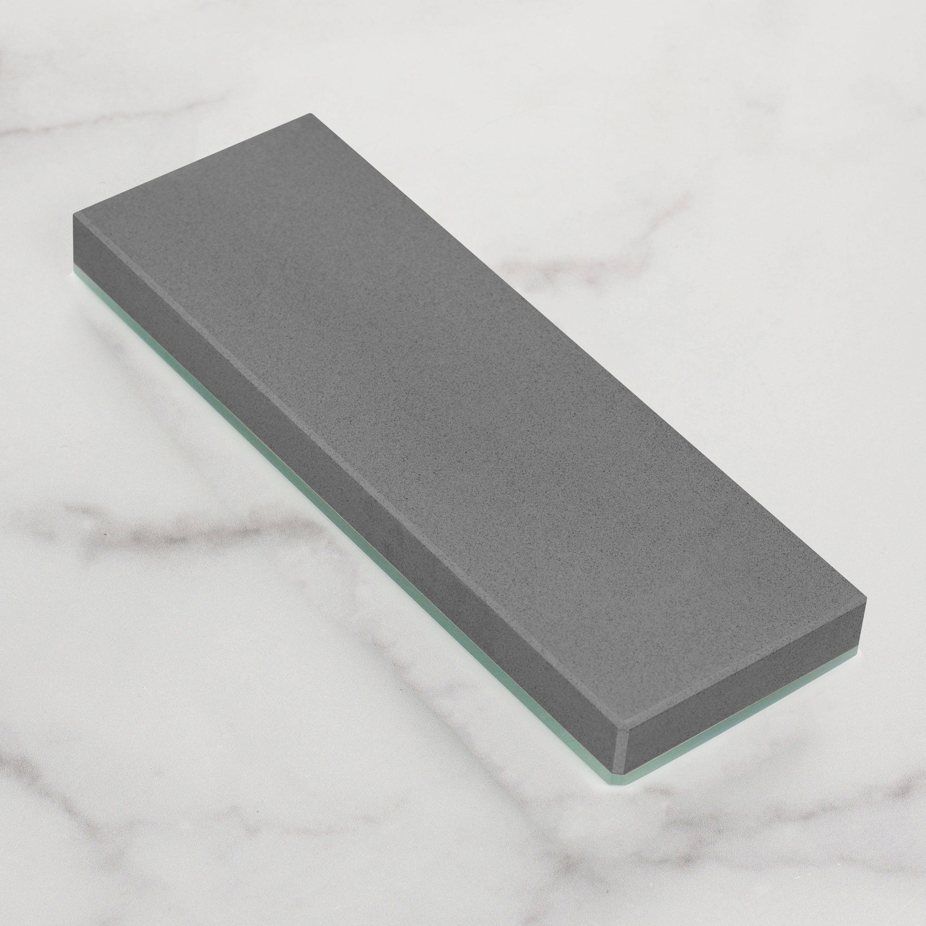 Close-up of Yaxell 400 grit water stone showing polished surface for knife sharpening