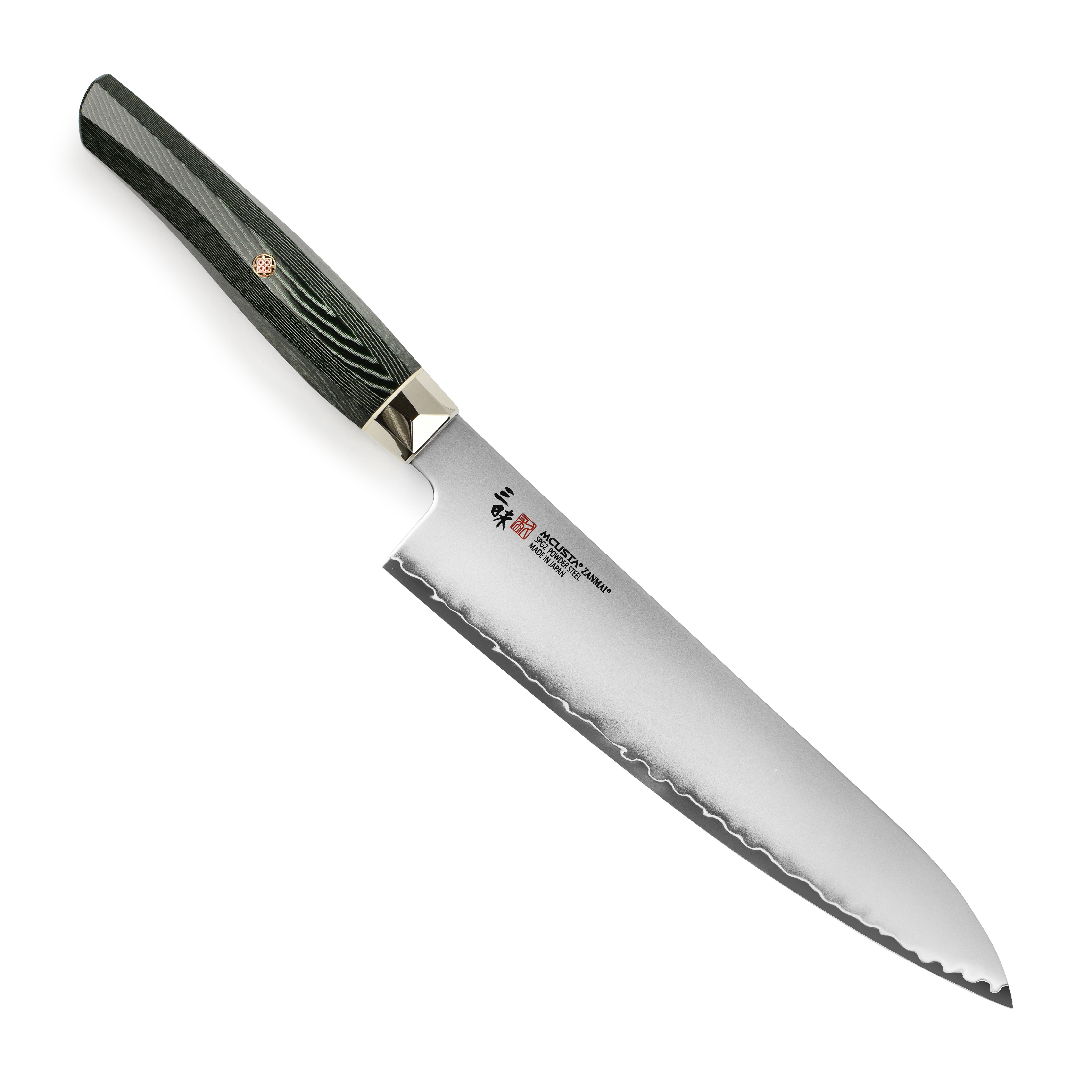 Zanmai Revolution SG2 kitchen knife displayed on a cutting board, showcasing its elegant green micarta handle.