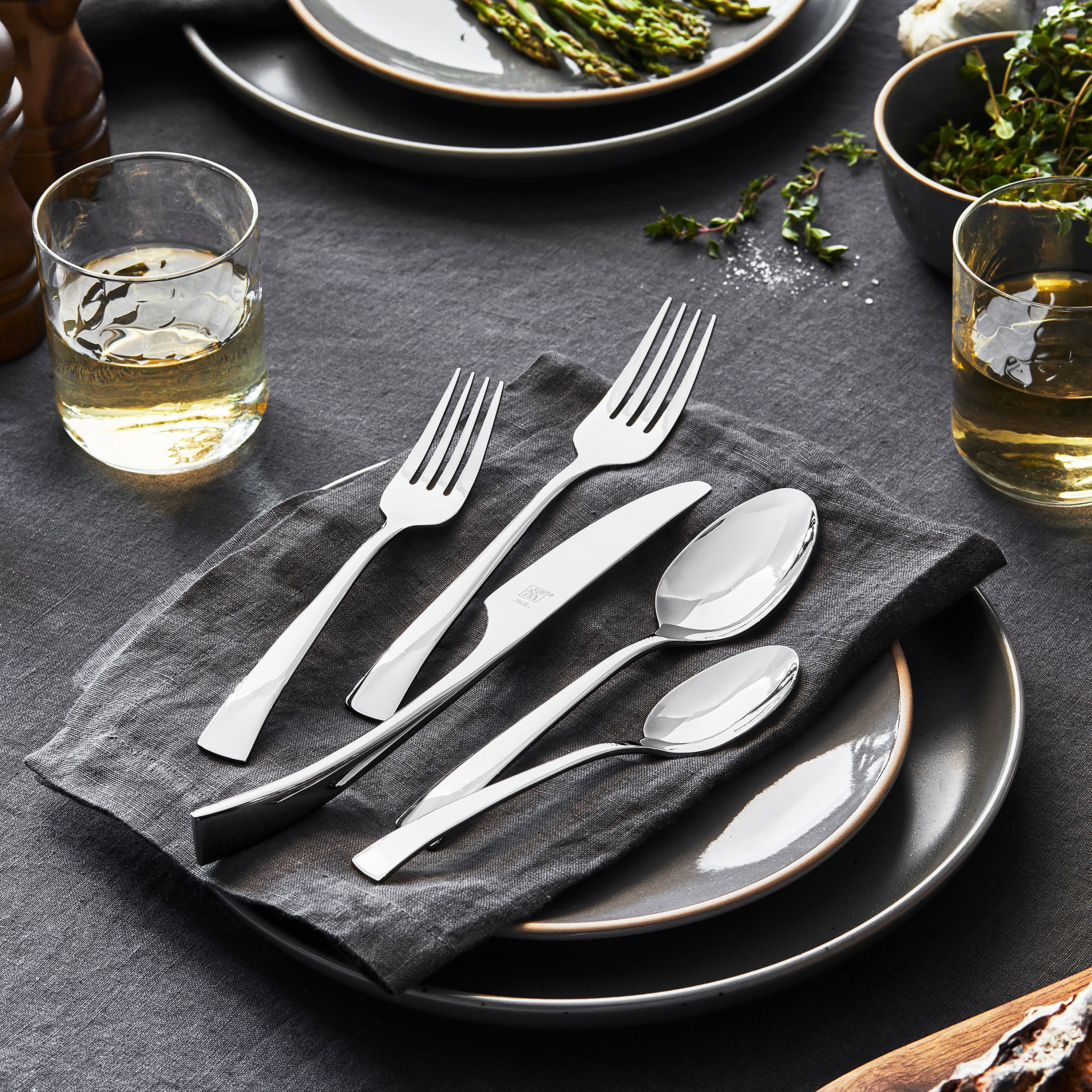 Close-up of Zwilling Bellasera polished flatware set with detailed view of utensils