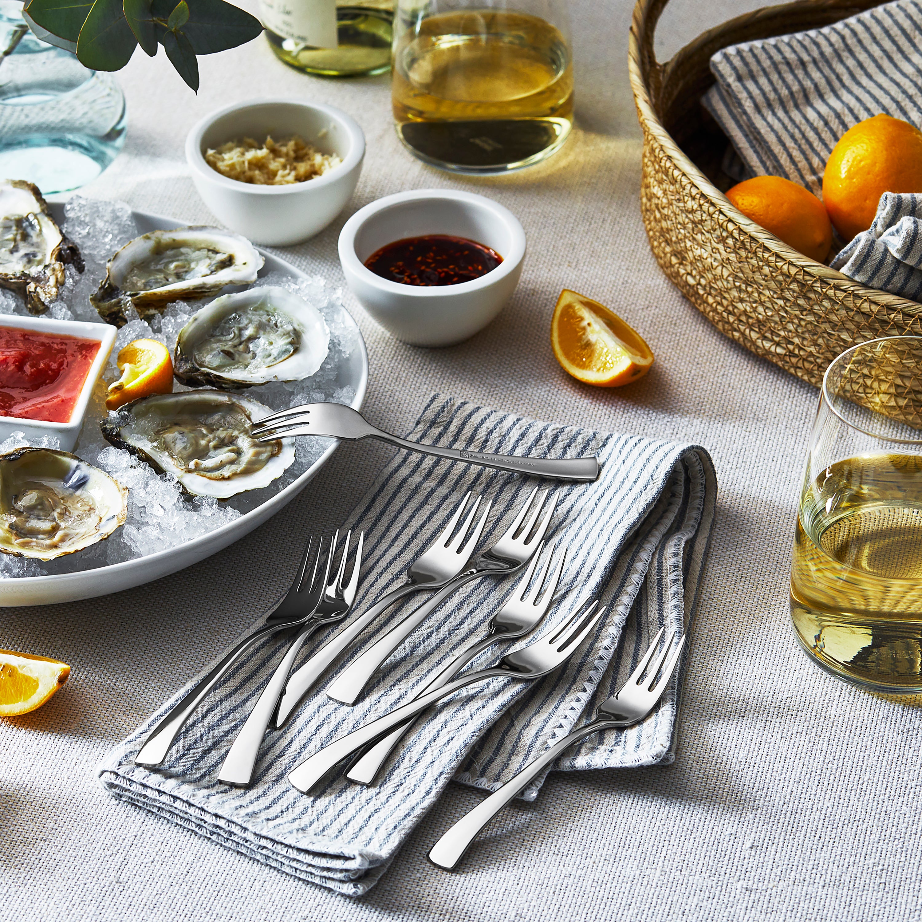 Close-up of Zwilling Bellasera polished flatware set with detailed view of utensils