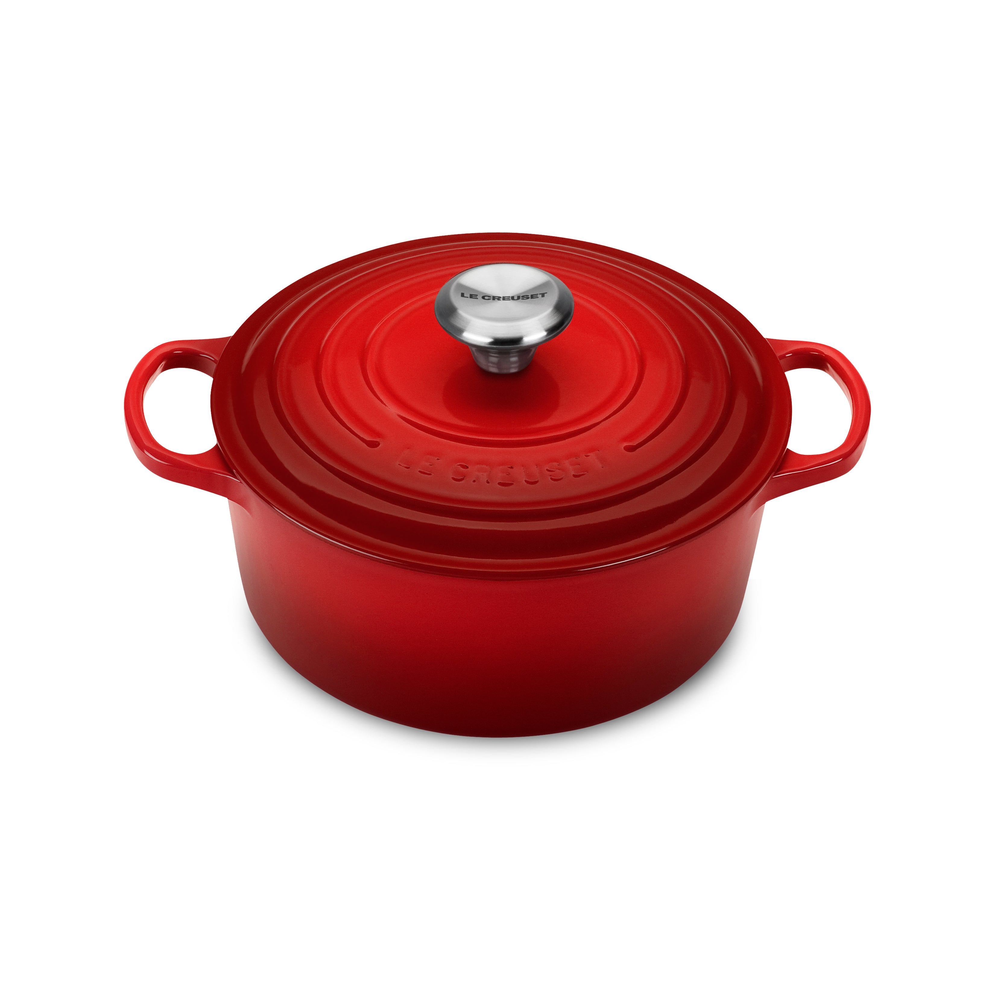 Cerise enameled Dutch oven showcasing its vibrant color and smooth finish.