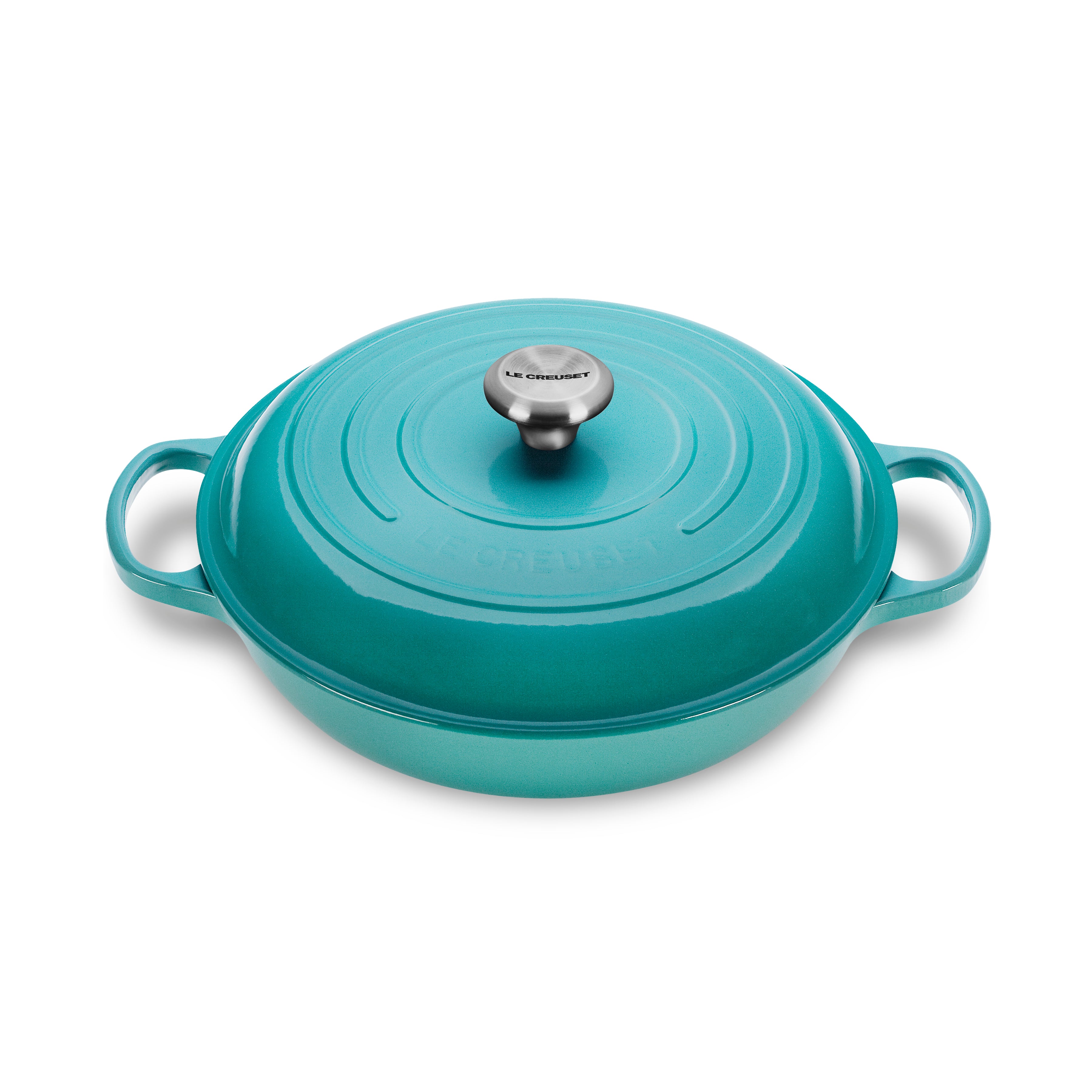 Le Creuset Caribbean Enameled Cast Iron Braiser from above, showcasing its vibrant color and ergonomic handles.