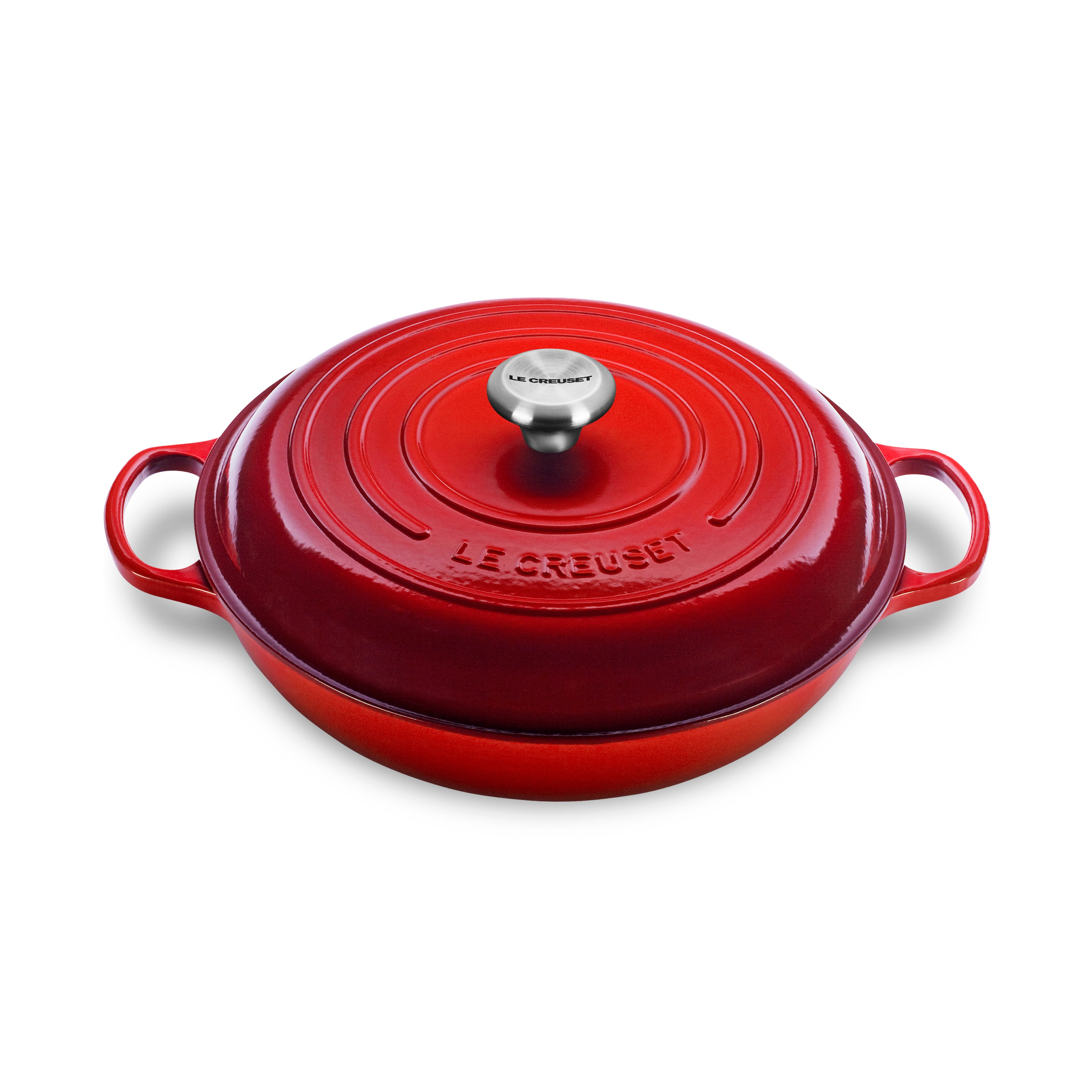 Le Creuset 3.5 quart braiser in cerise showcasing ergonomic handles and stainless steel knob