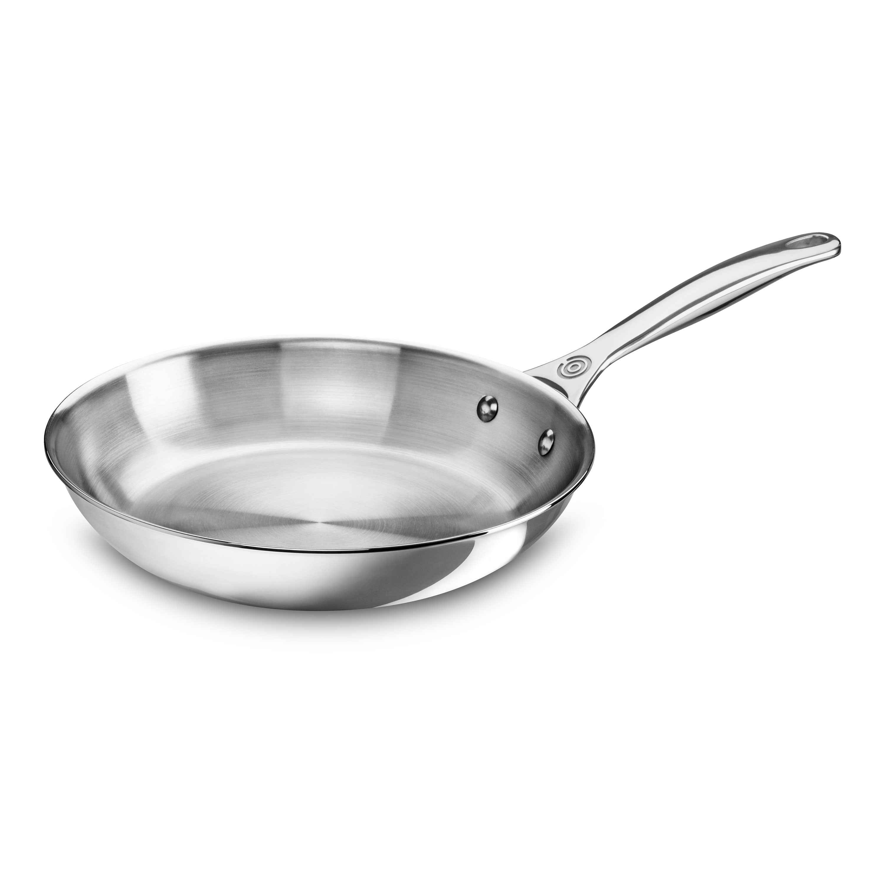 Le Creuset stainless steel skillet on induction stove showing full view
