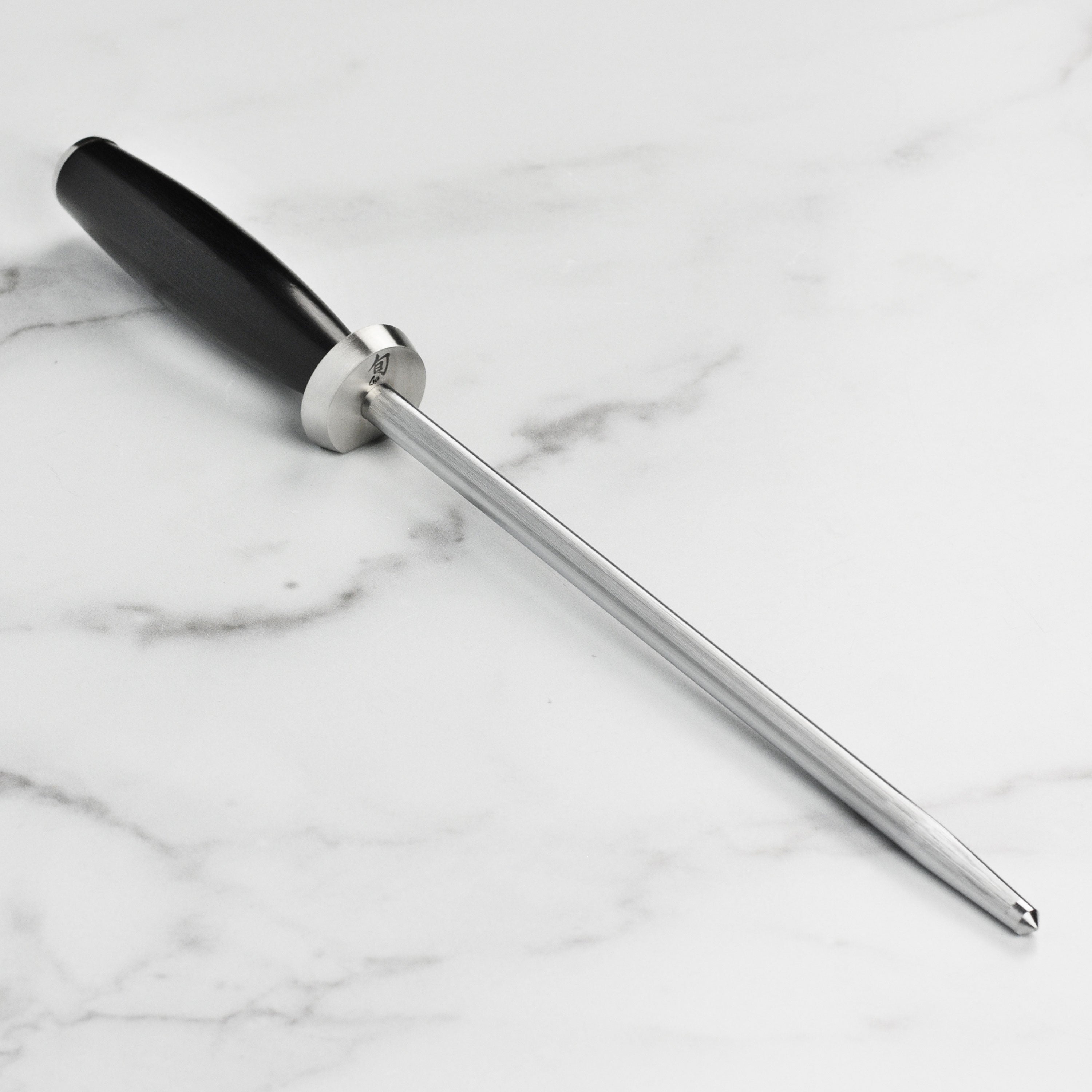 Side view of Shun 9-Inch honing steel showcasing the smooth and micro-ribbed surfaces.