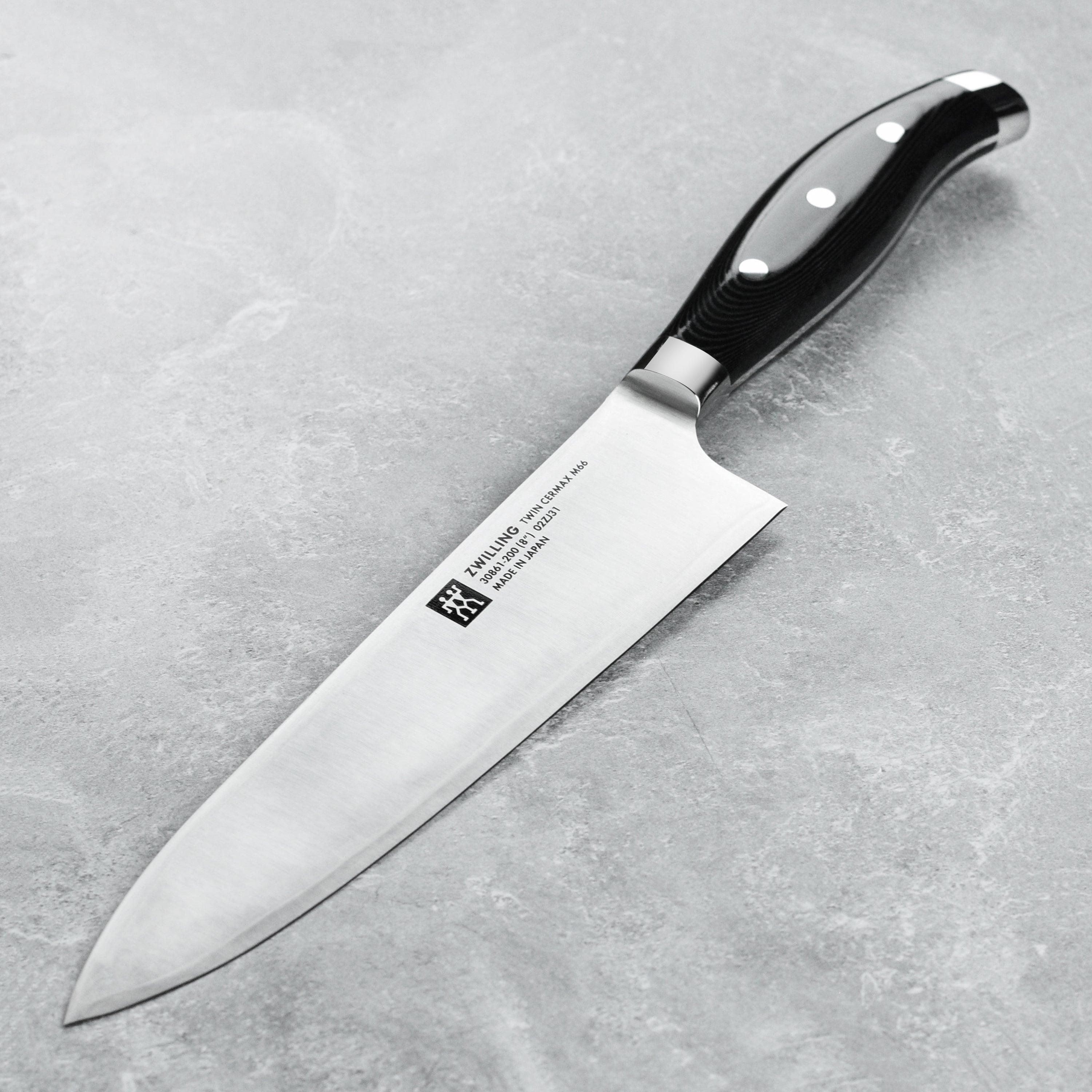 Close-up of the Zwilling Twin Cermax M66 knife highlighting the blade's edge and handle design.