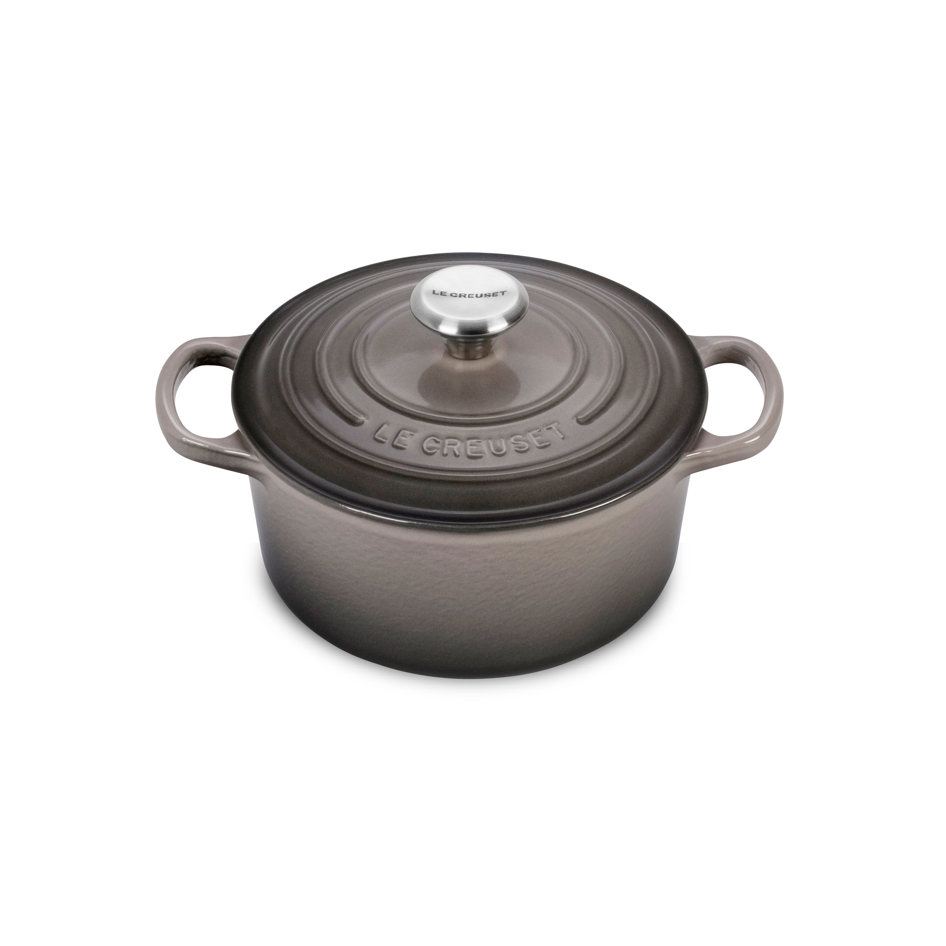 Side view of the Le Creuset Dutch oven highlighting its sturdy handles and sleek enamel finish.