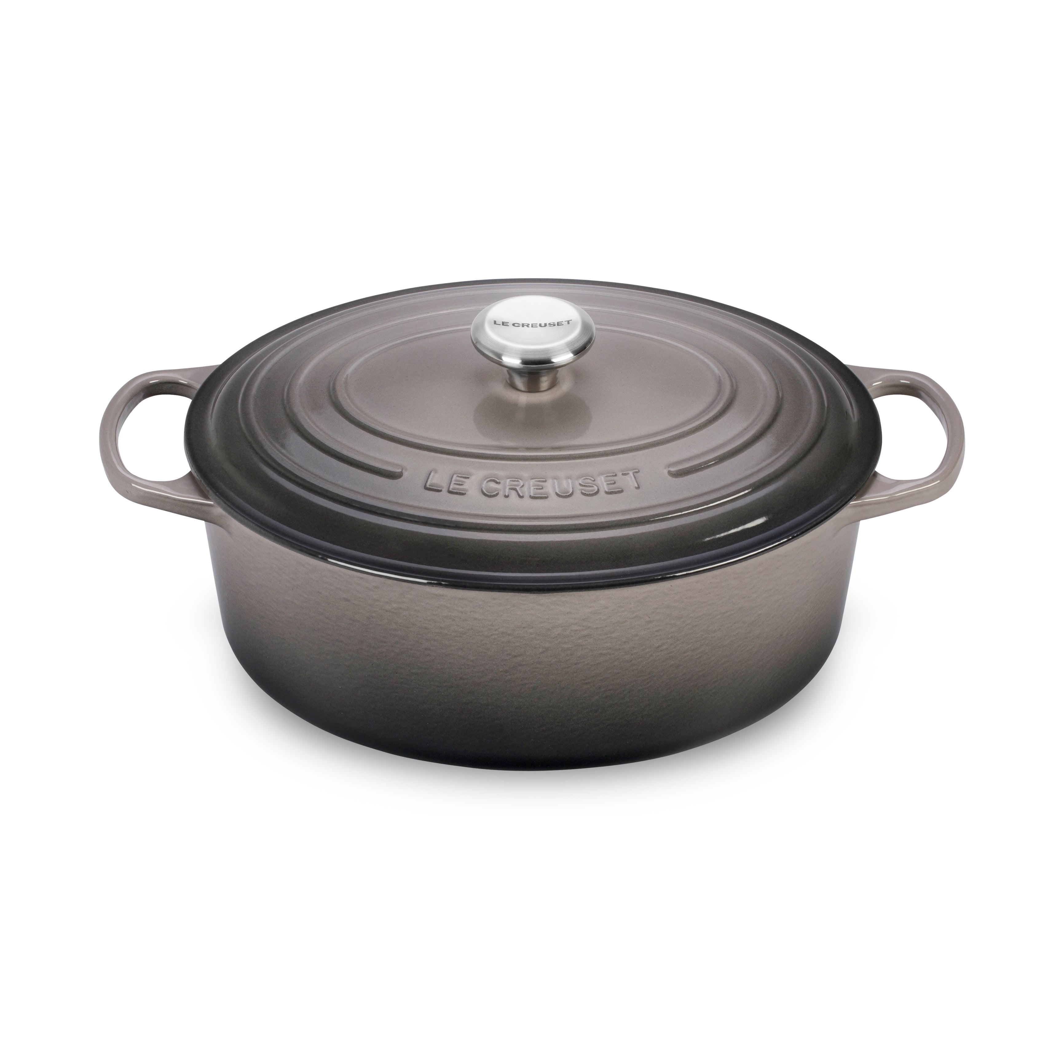 Le Creuset oval Dutch oven in oyster color, front view showing lid and handles