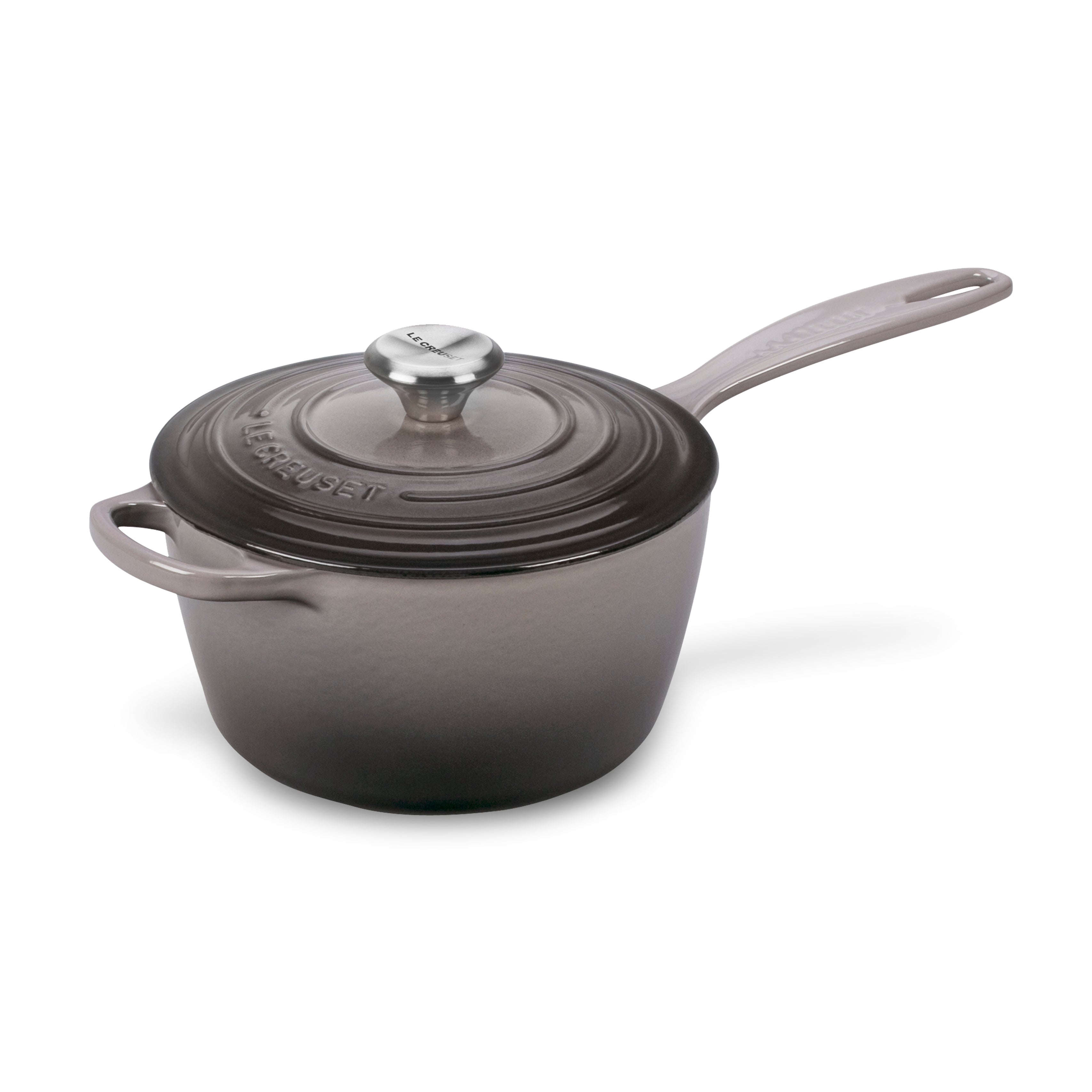Side angle view of Le Creuset saucepan showing ergonomic knob and lid fit