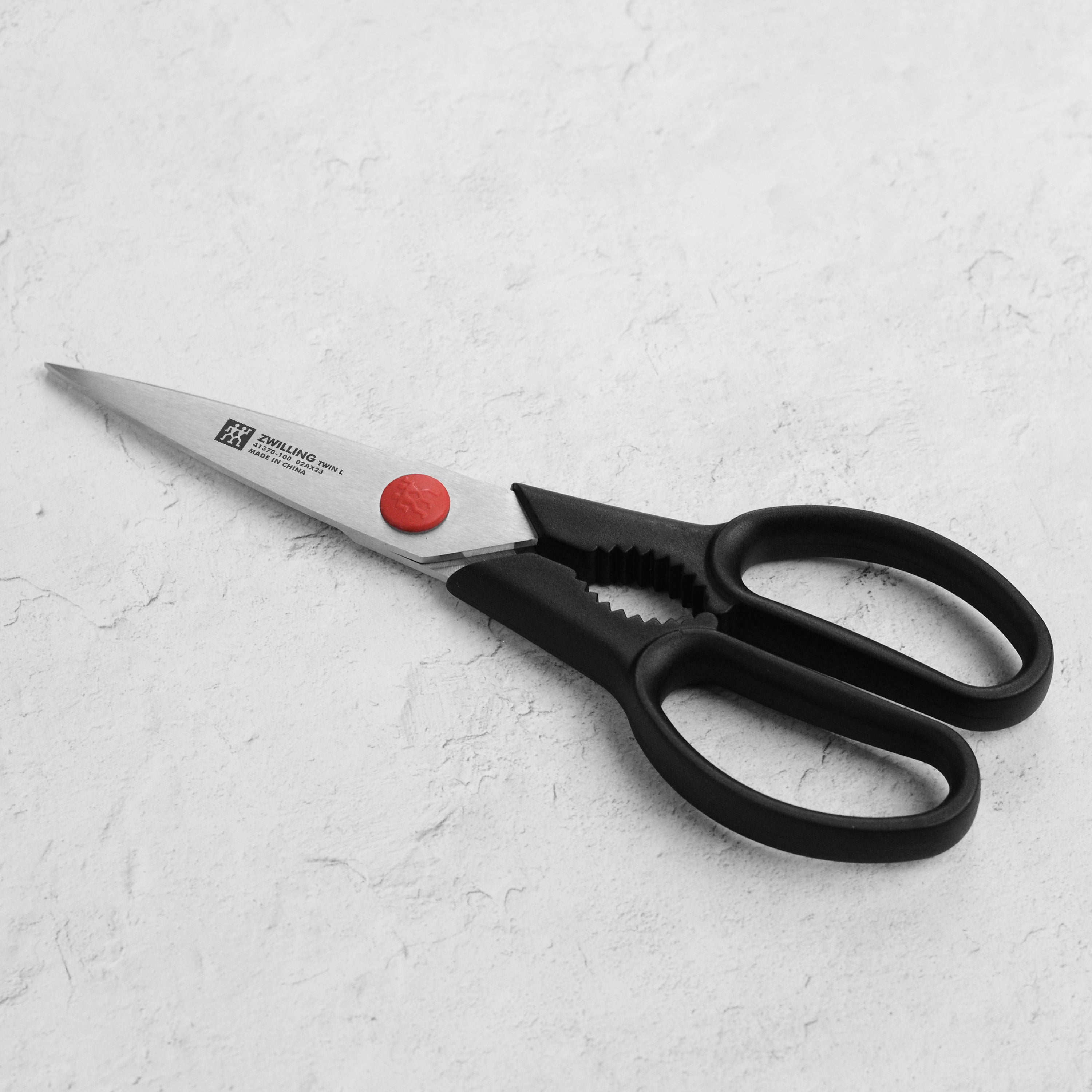 Zwilling Twin L kitchen shears showing precision cutting edge and comfortable handles.