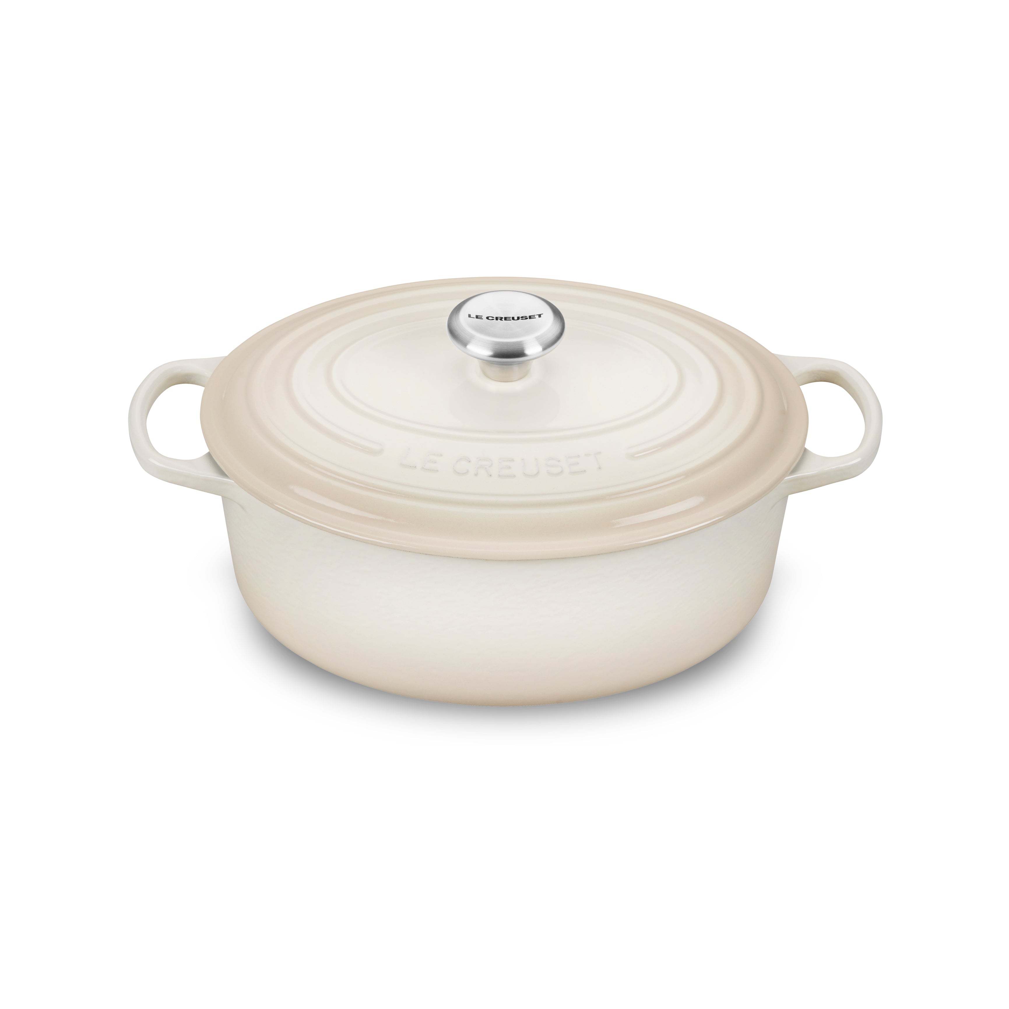 Le Creuset Meringue Oval Dutch Oven showcasing its elegant design and ergonomic handles.