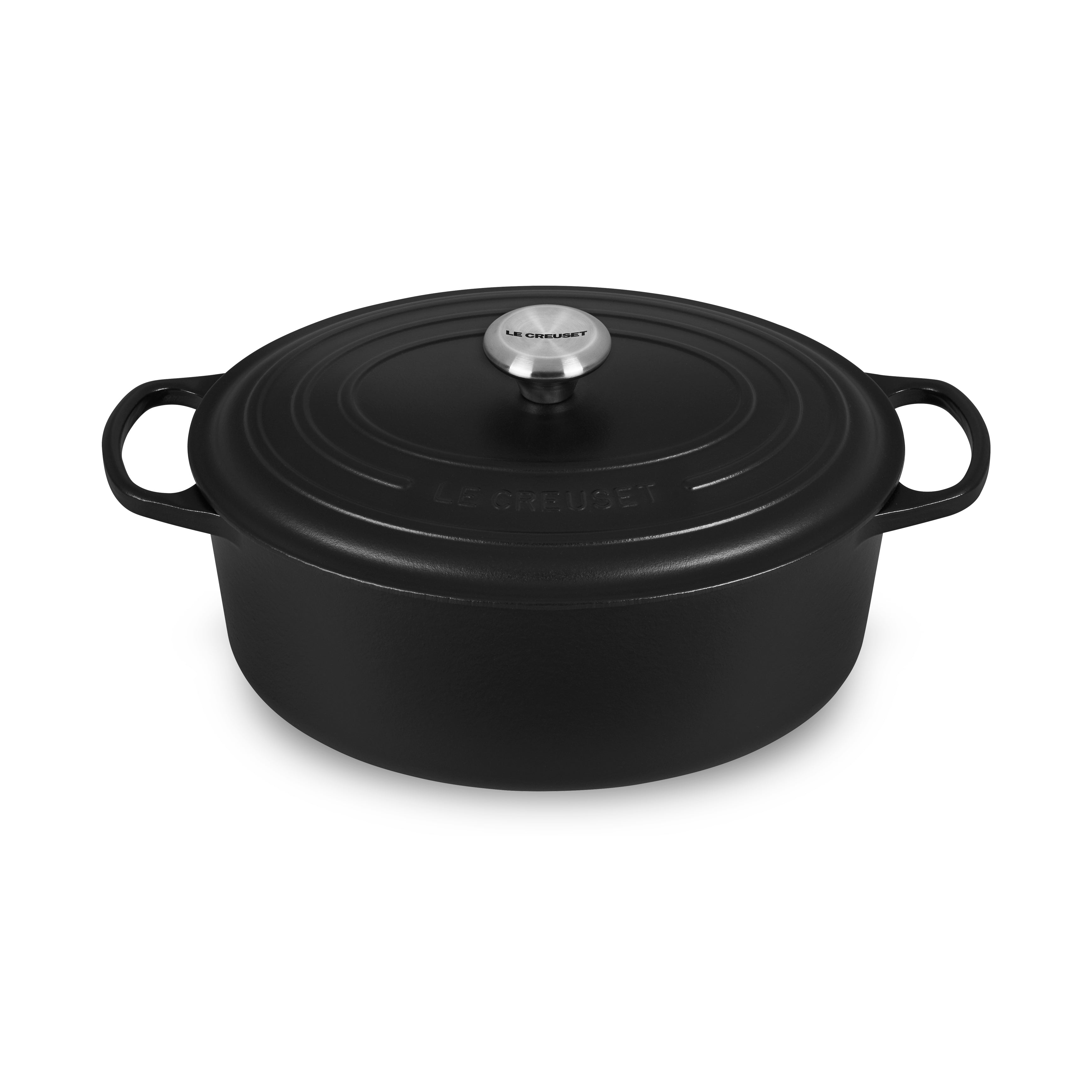 Top view of Le Creuset 6.75 quart oval dutch oven in Licorice, showcasing lid and ergonomic handles