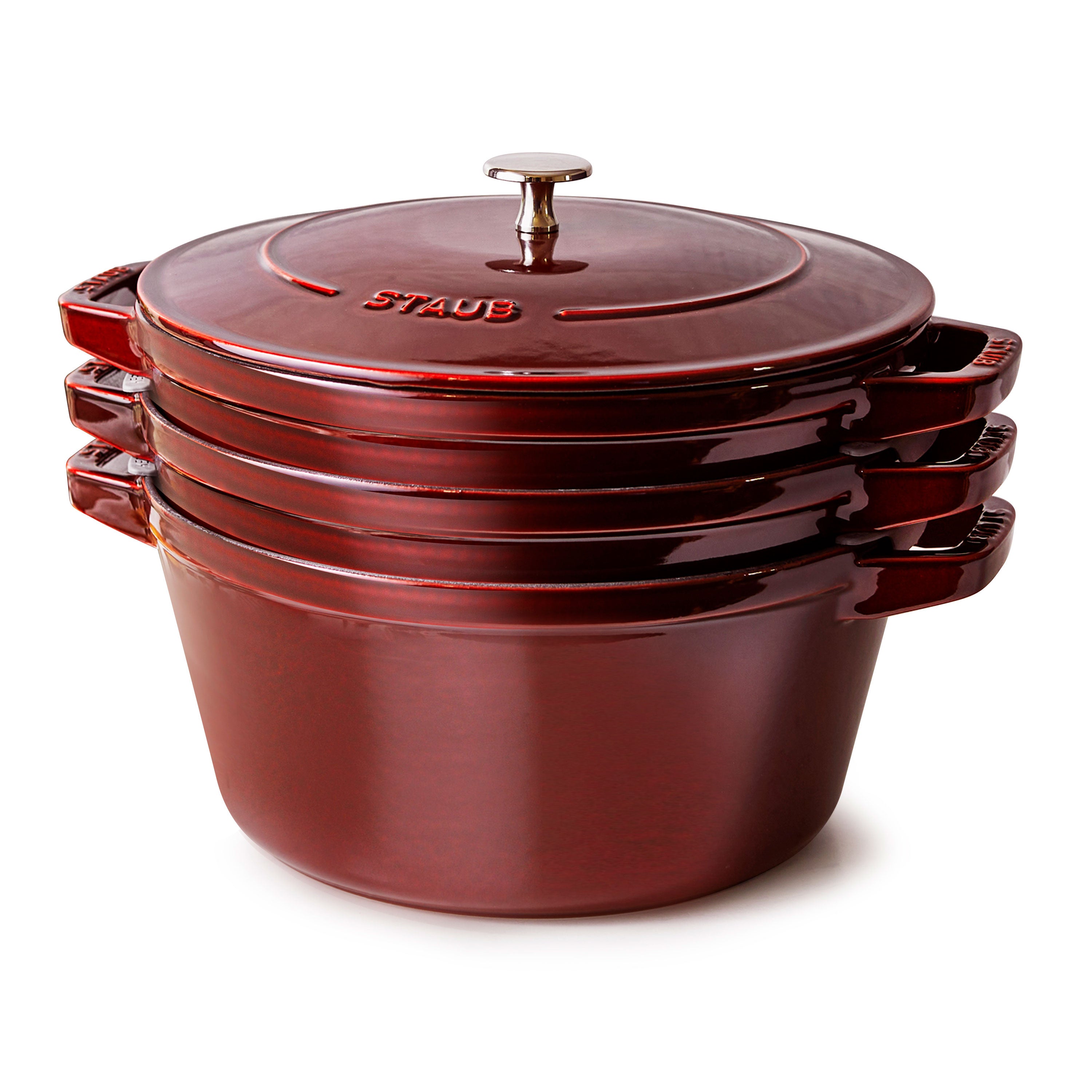 Close-up of the Grenadine cast iron cookware set showcasing the textured black matte enamel interior.