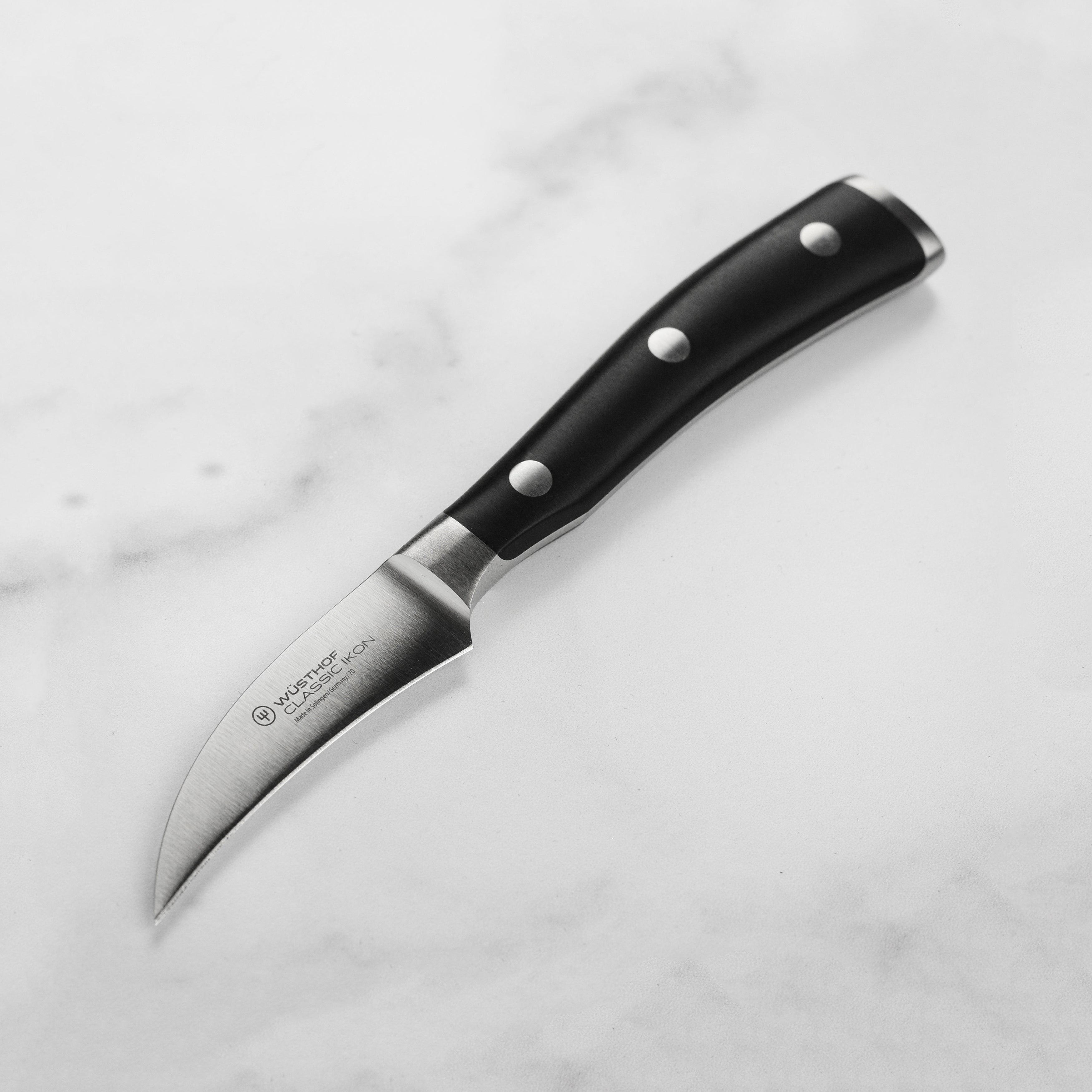 Wusthof Classic Ikon peeling knife blade close-up for precise peeling