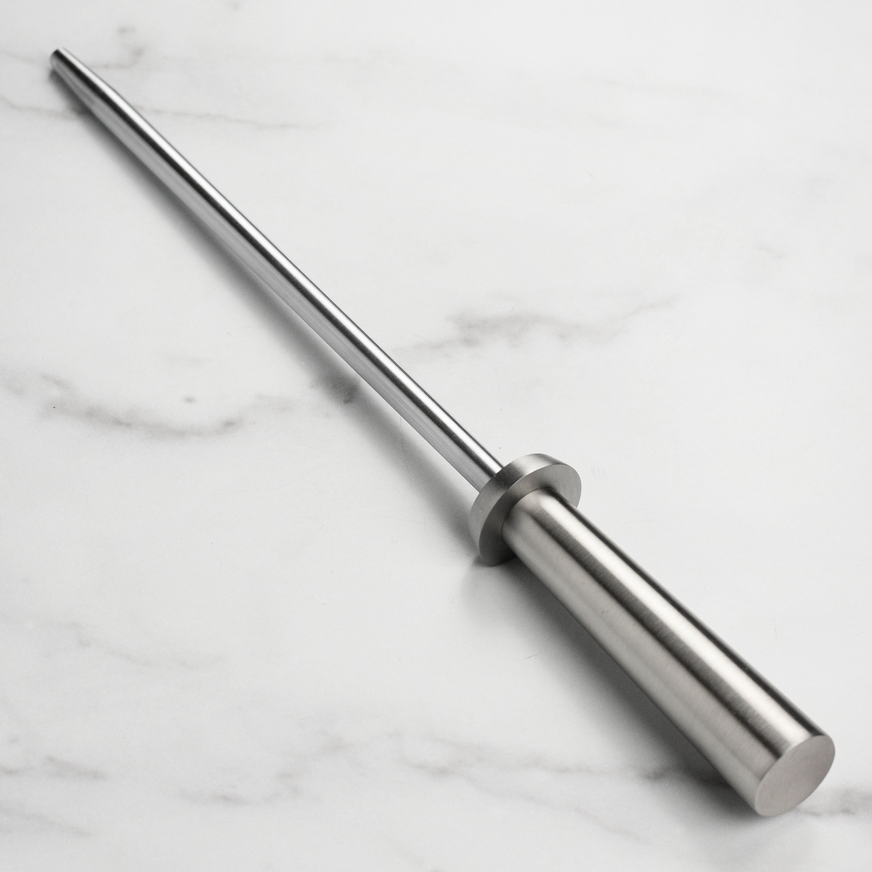 Shun 9-inch professional honing steel with smooth surface and satin handle.