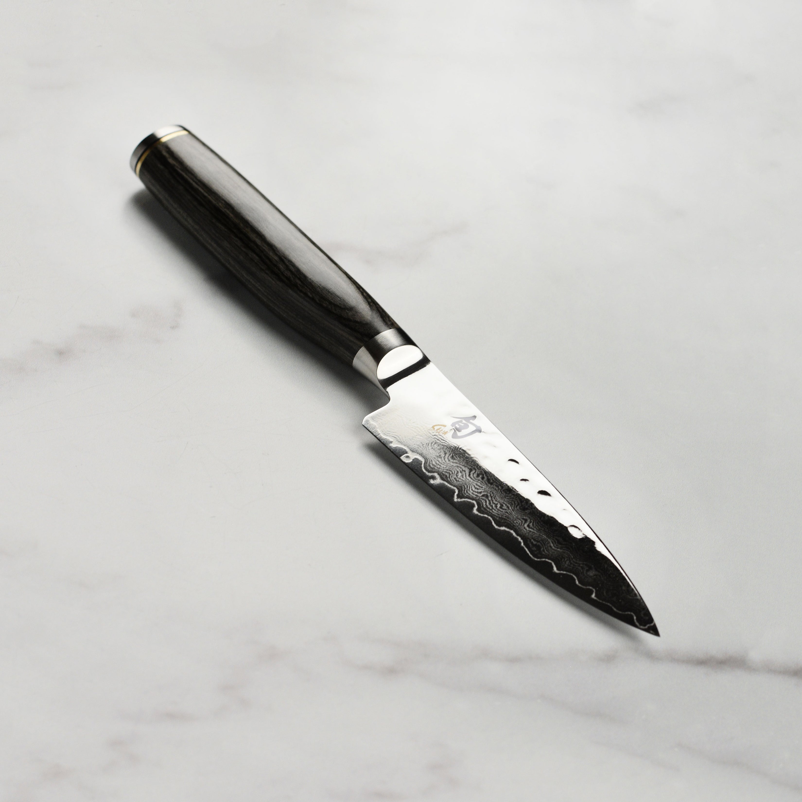 Shun Premier Grey 4-inch paring knife blade with Damascus steel layers