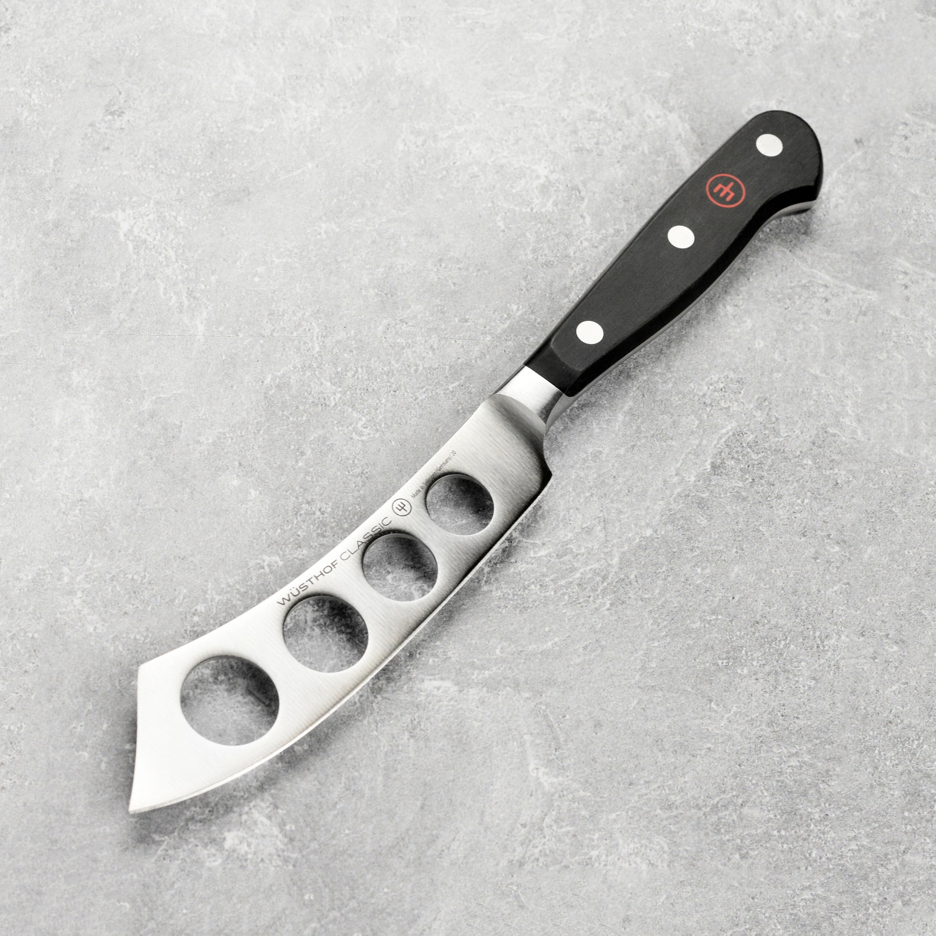 Close-up of the Wusthof Premium Soft Cheese Knife showcasing its sharp blade and POM handle.