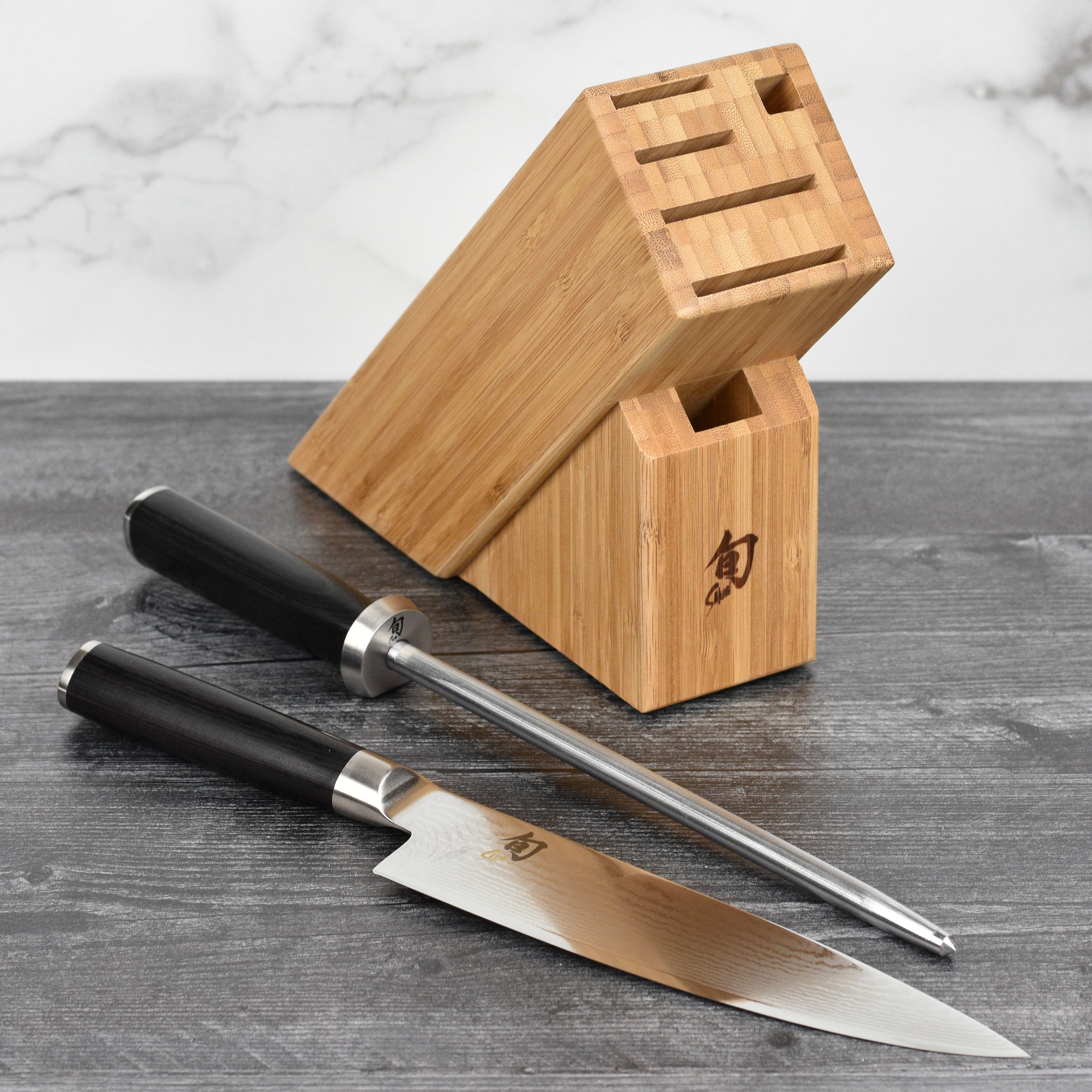 Close-up of Shun Classic 8-inch Japanese chef's knife with Damascus pattern