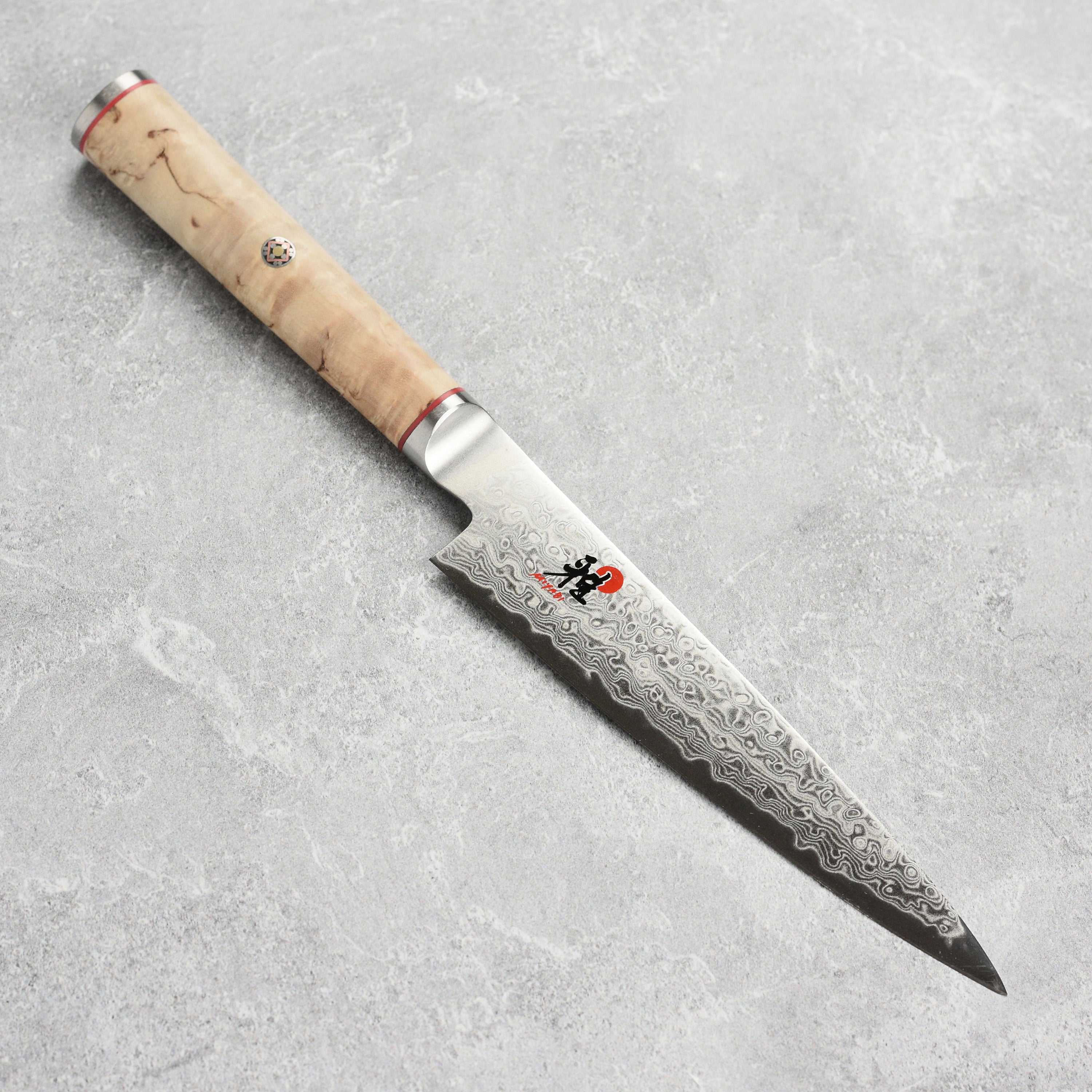 Miyabi Birchwood SG2 Damascus utility knife with layered steel blade and traditional Japanese handle