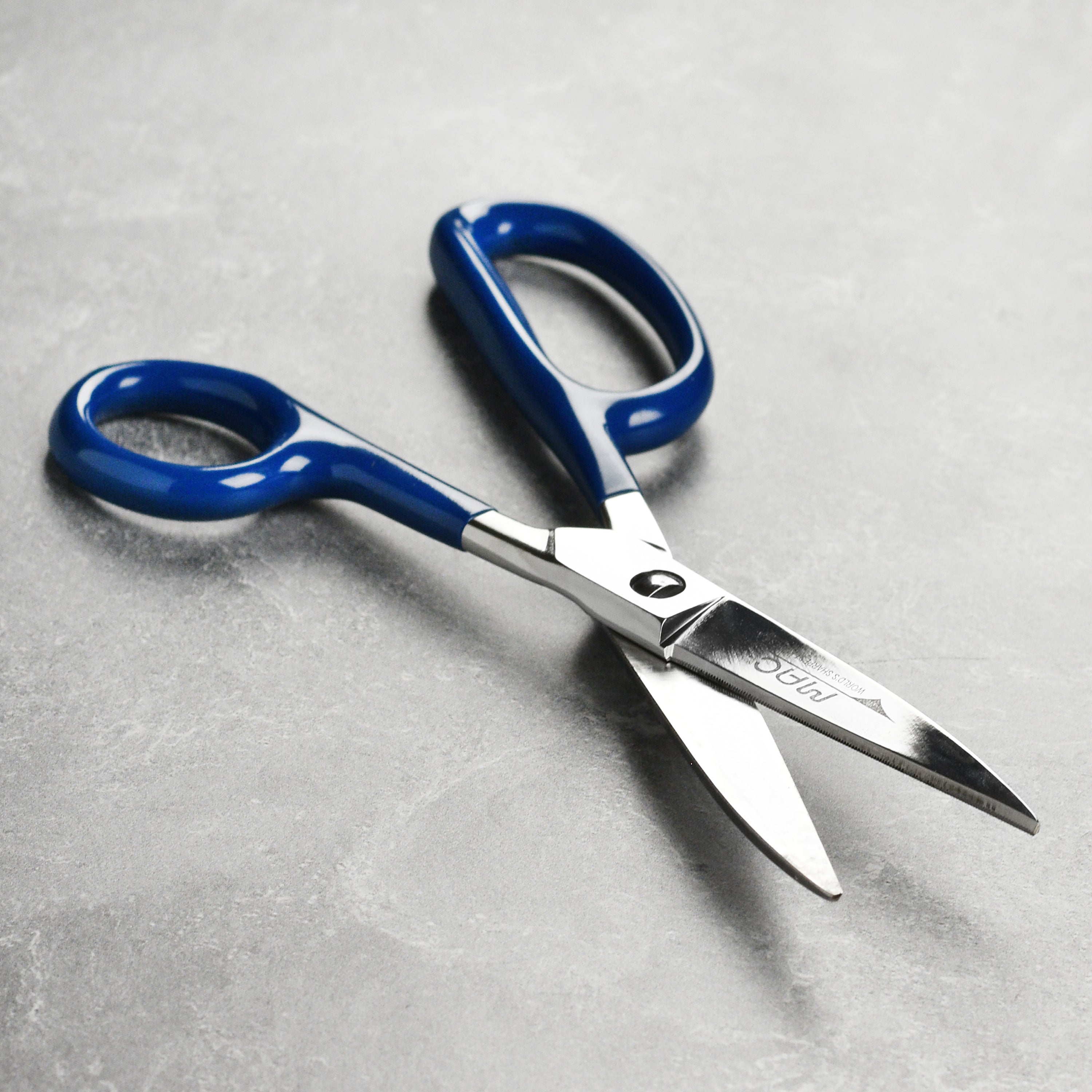 Close-up of Japanese heavy-duty kitchen shears, showcasing the drop-forged stainless steel blades.