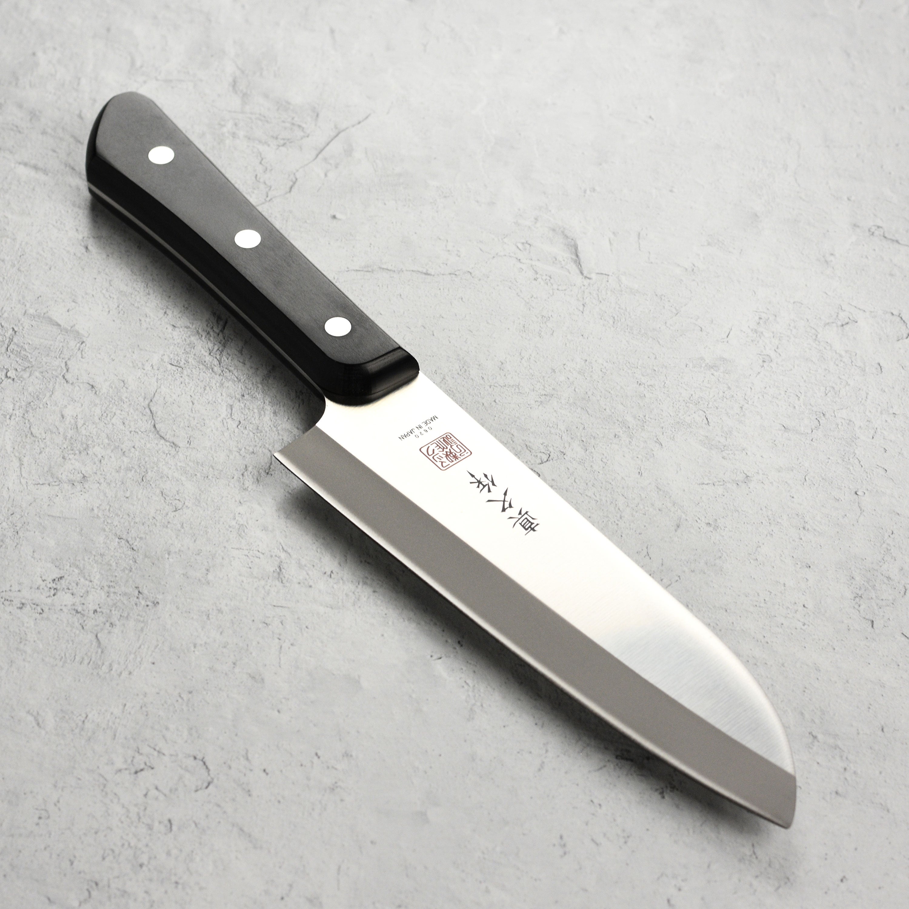MAC Superior 6.5-inch Santoku knife with razor-sharp blade and Pakkawood handle for professional chefs