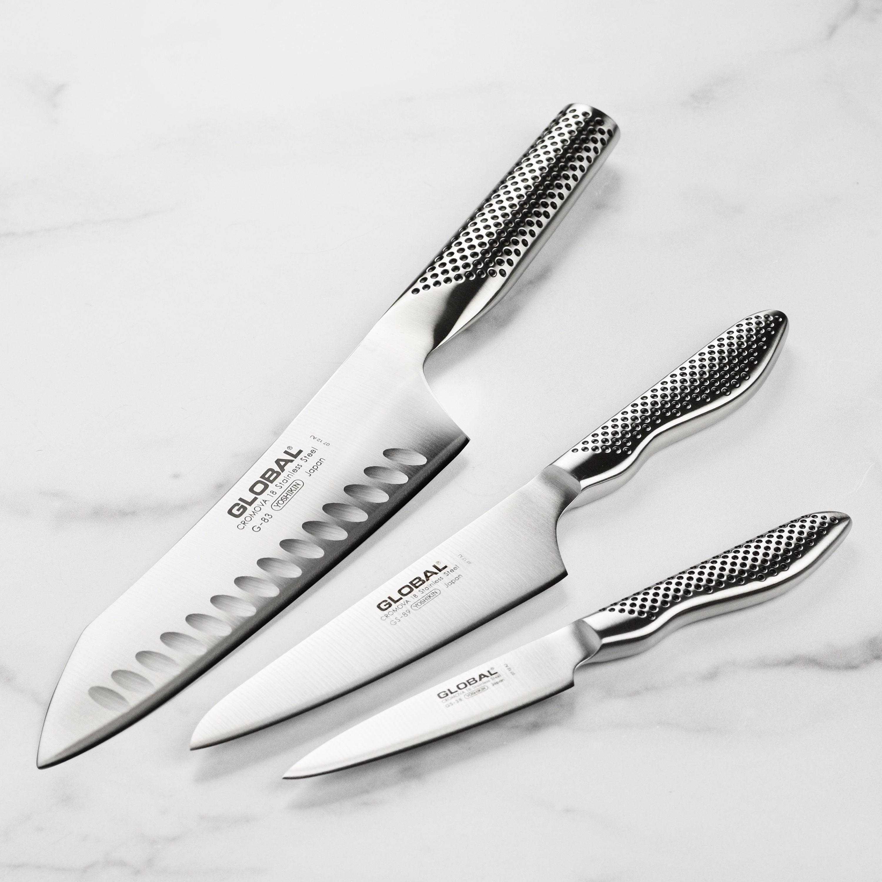 Close-up of a Japanese chef knife with high-carbon stainless steel blade for precise cutting