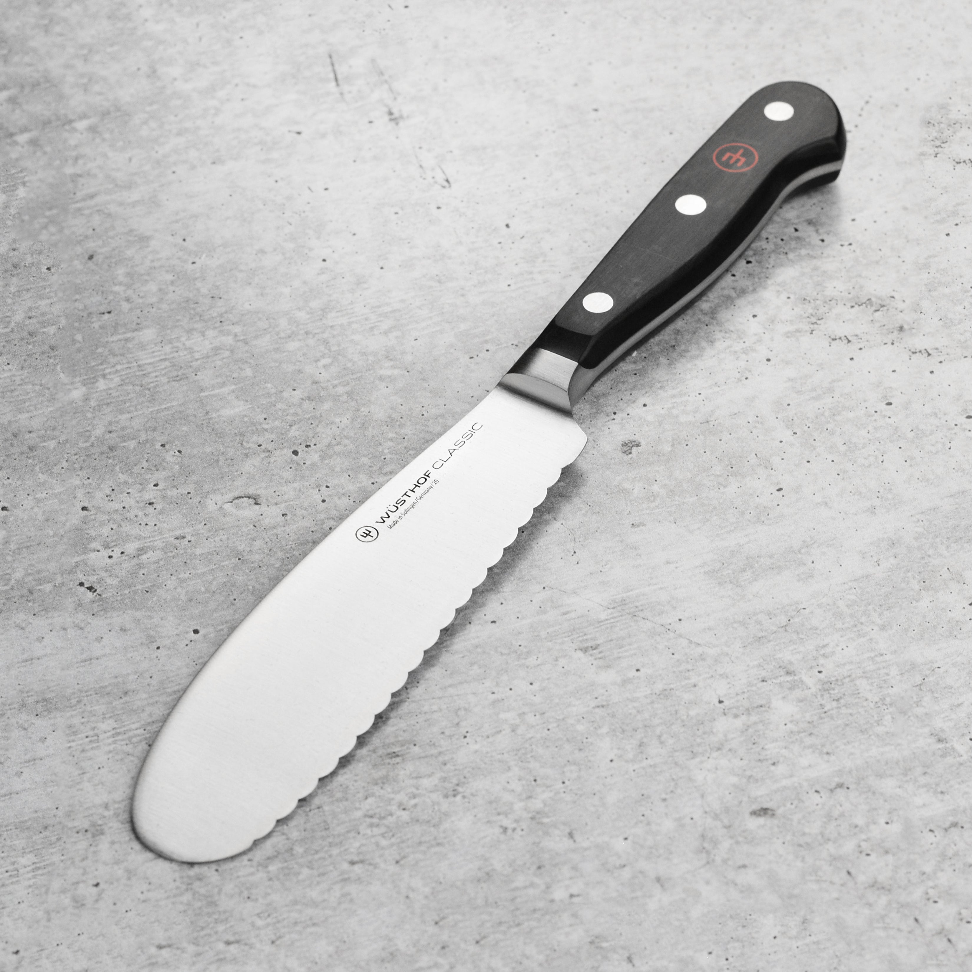 Wusthof Classic sandwich knife with a high-carbon steel blade, perfect for slicing sandwiches.
