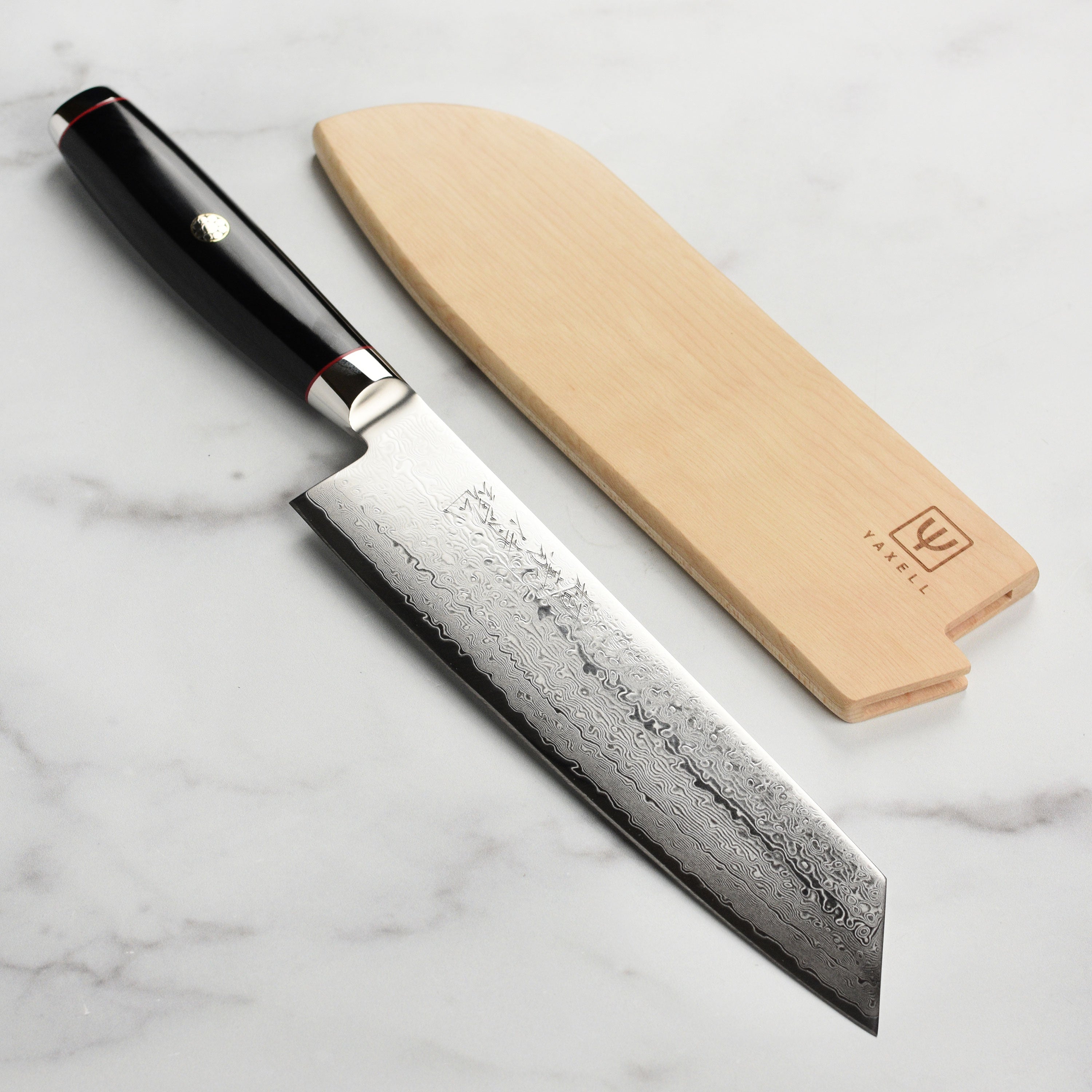 Yaxell Kiritsuke knife shown from side angle, highlighting 193-layered SG2 steel blade