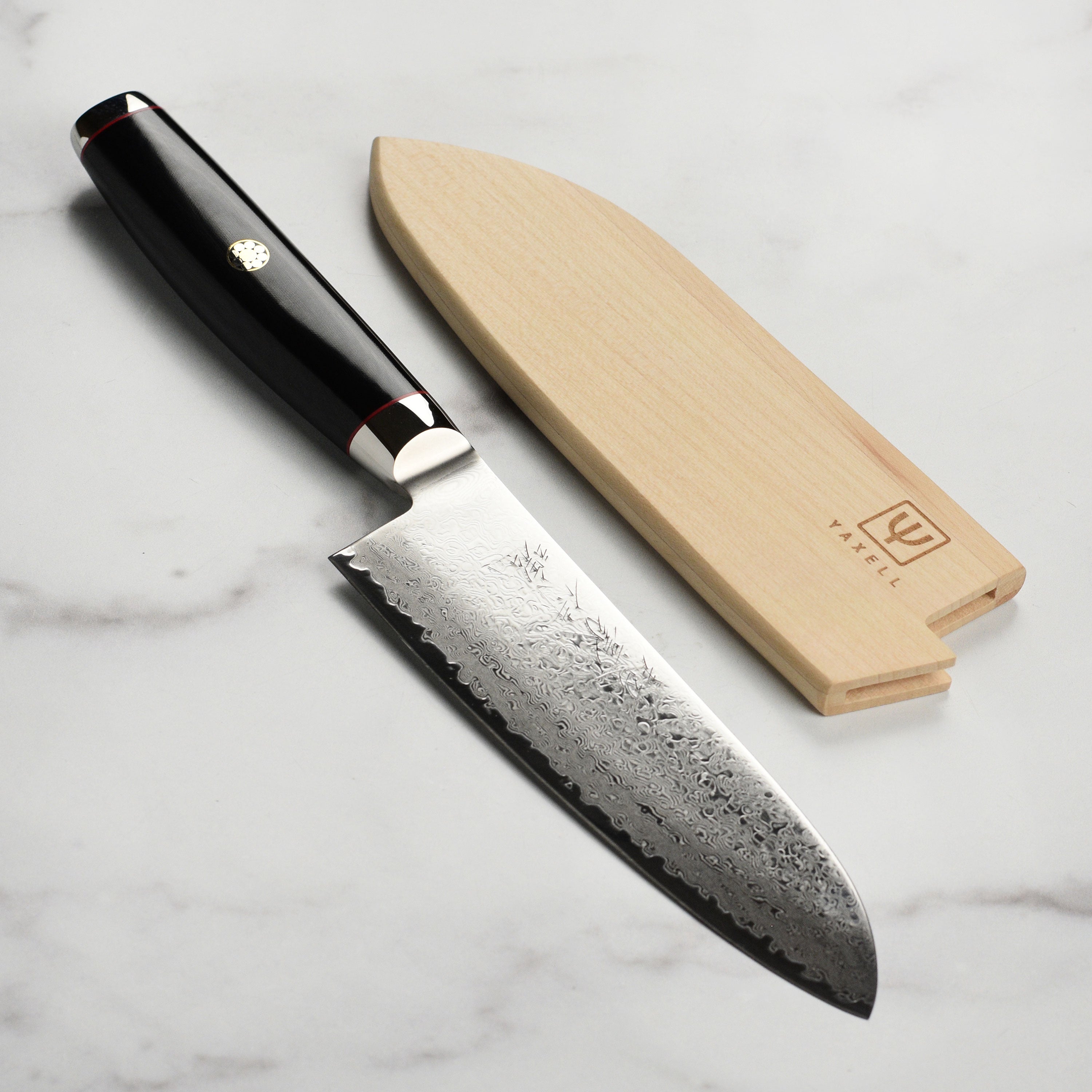 Yaxell Ypsilon SG2 Santoku Knife showing the blade with its elegant Damascus layers and micarta handle