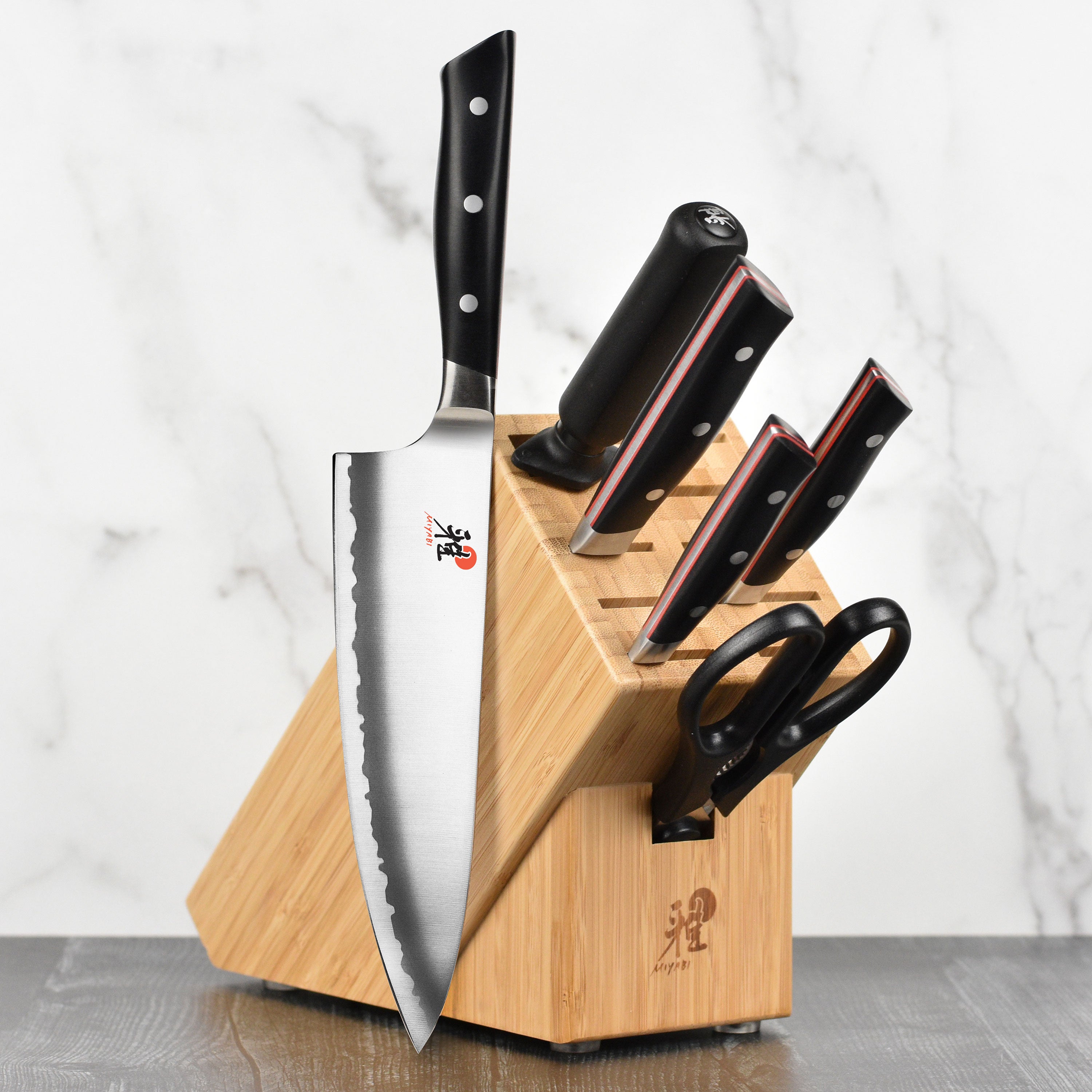 Miyabi Evolution knife block set showcasing sleek design and sharp blades.