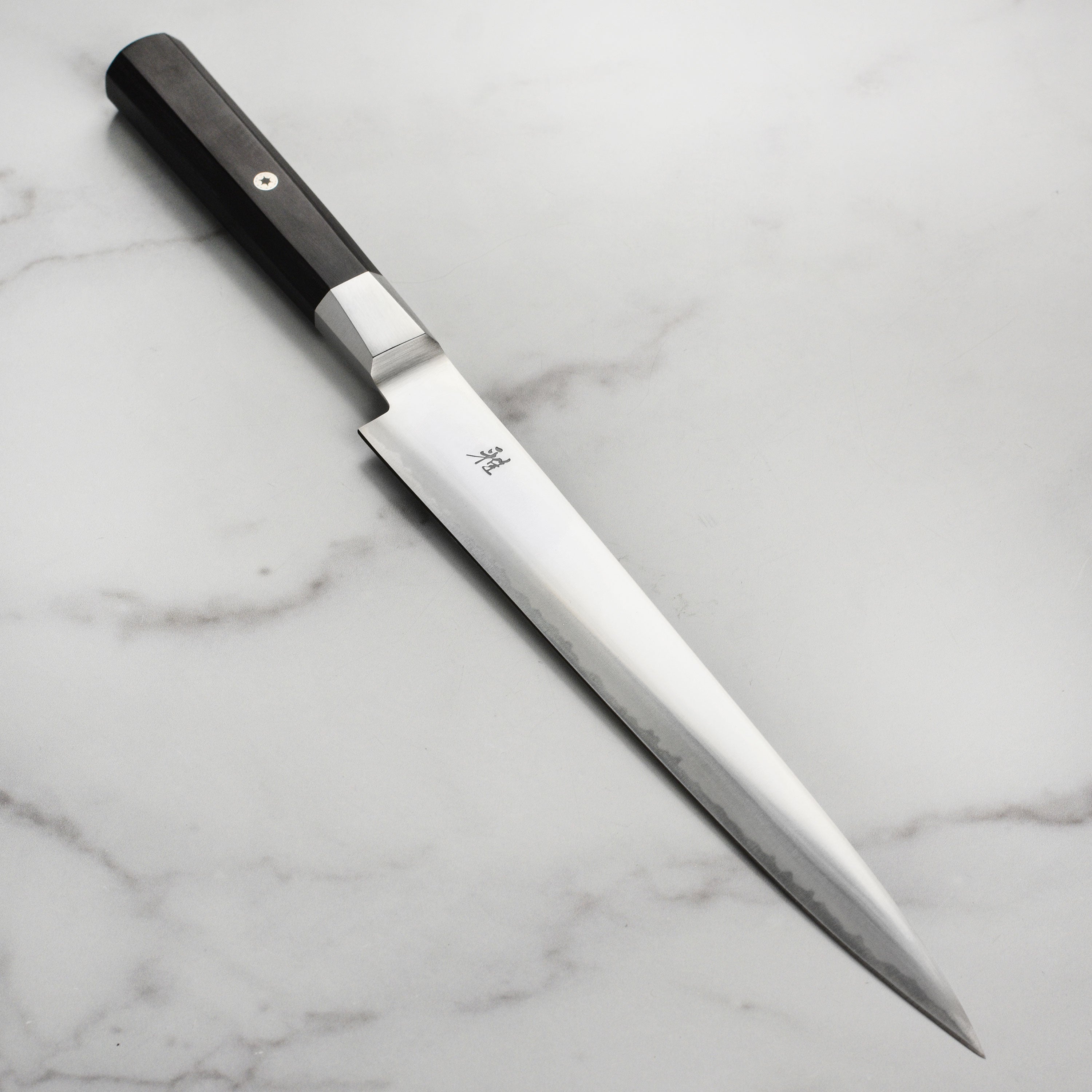 Miyabi Koh 9.5-inch Japanese slicing knife with detailed blade view