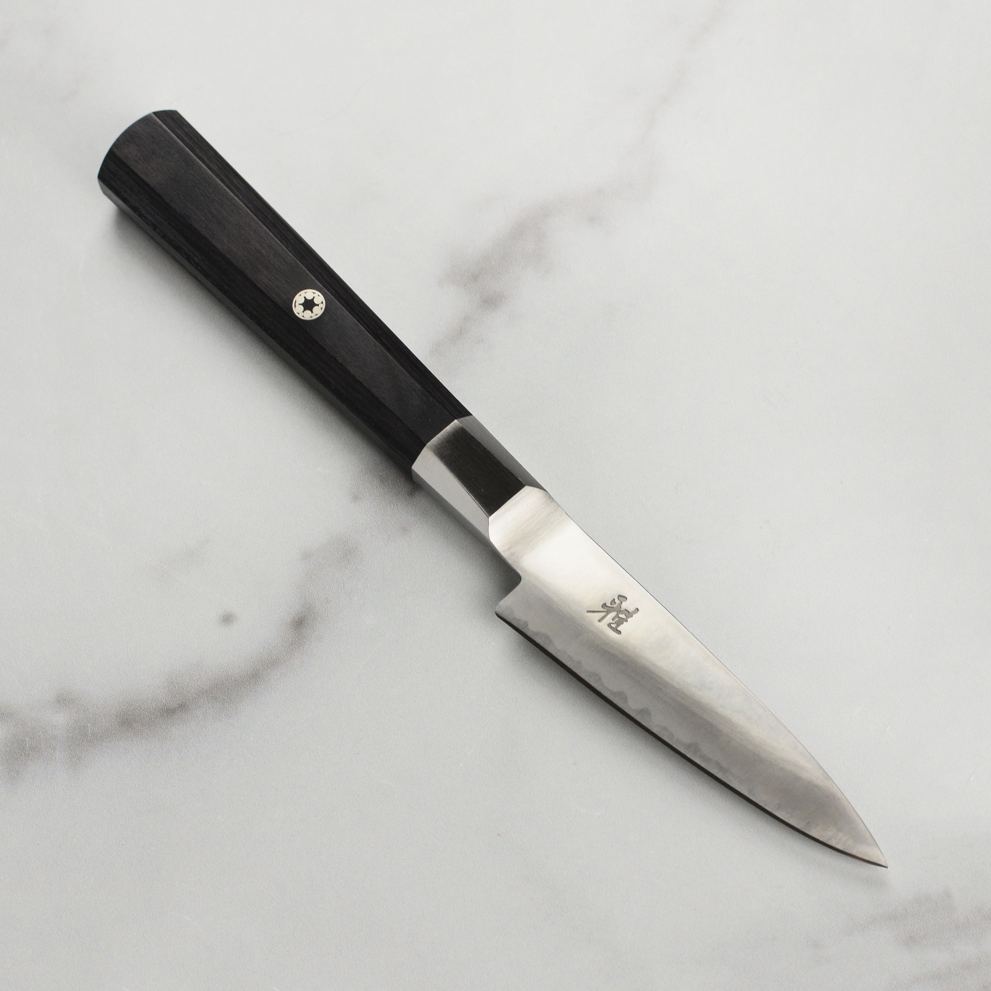 Miyabi Koh 3.5-inch Japanese paring knife with detailed blade and elegant pakkawood handle