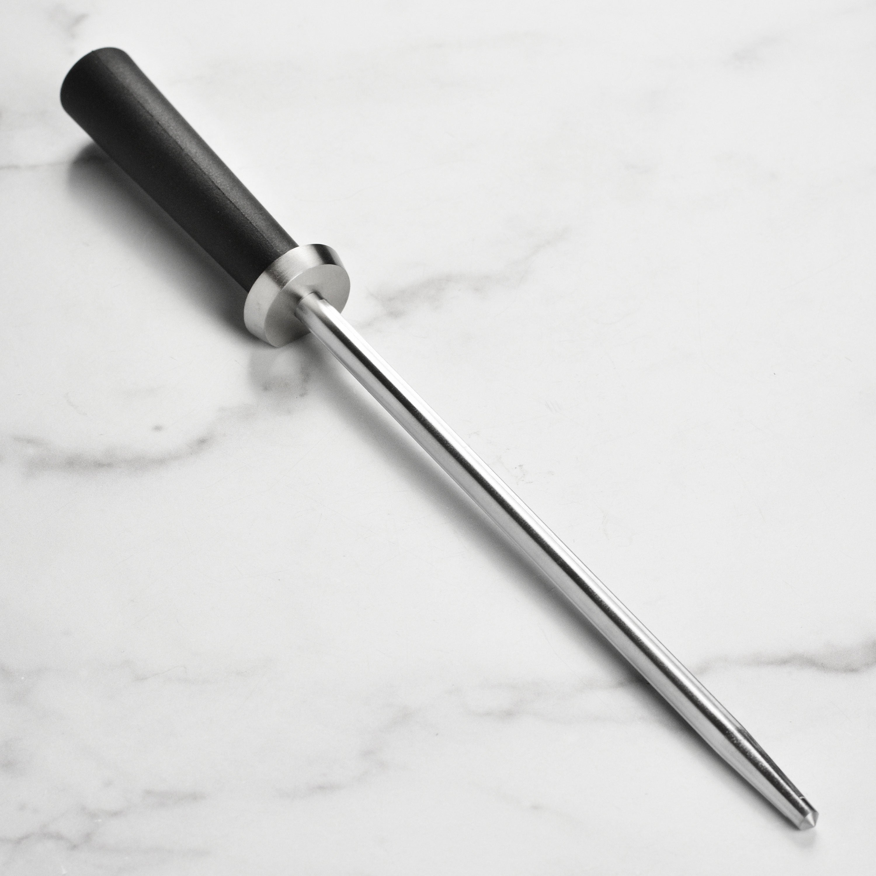 Shun Sora 9-inch honing steel with textured black handle and patented angle guide on white background