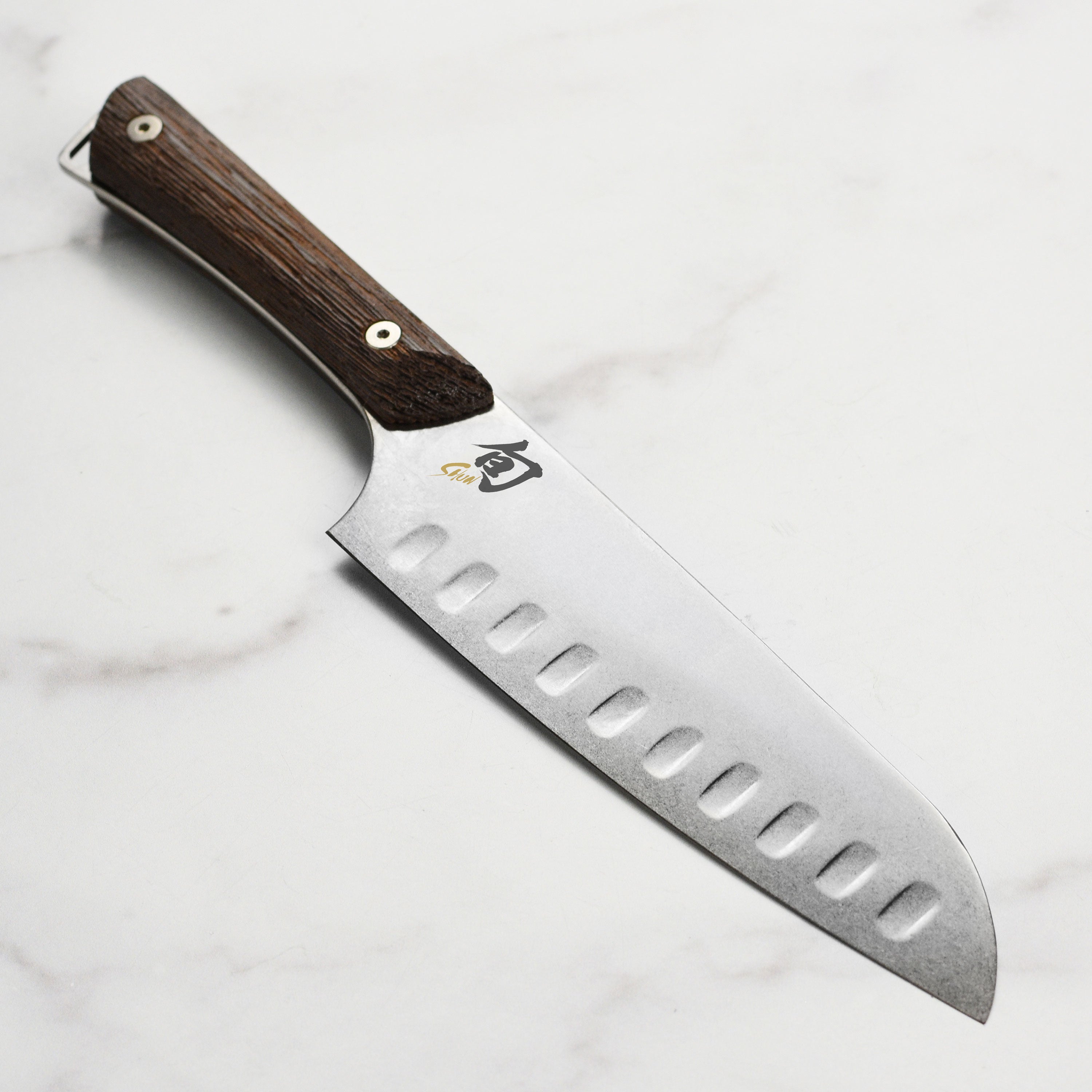 Shun Kanso 7-inch Santoku knife with rustic high-carbon steel blade for home cooking