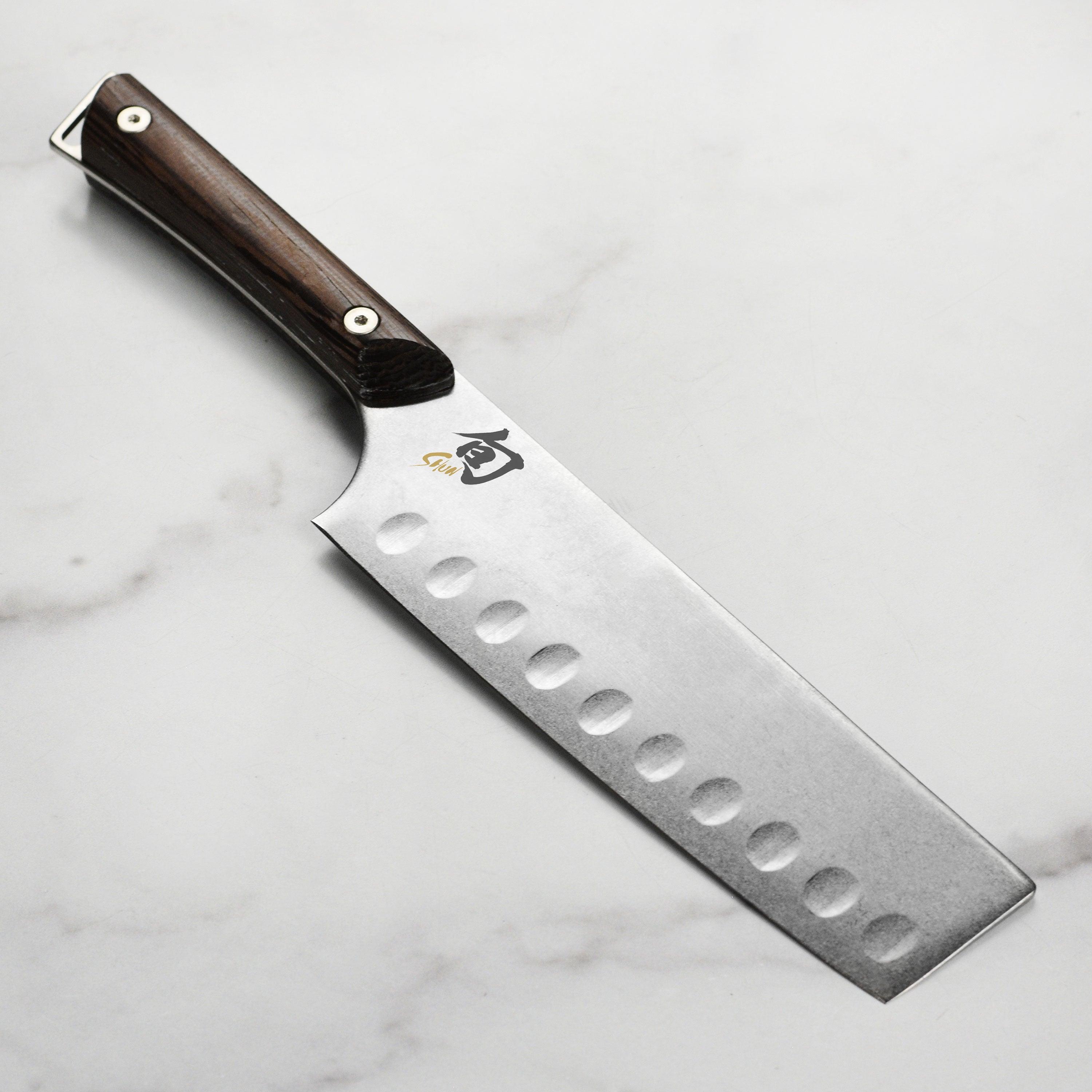 Shun Kanso 6.5-inch hollow edge Nakiri knife with Tagayasan wood handle for precise vegetable cutting