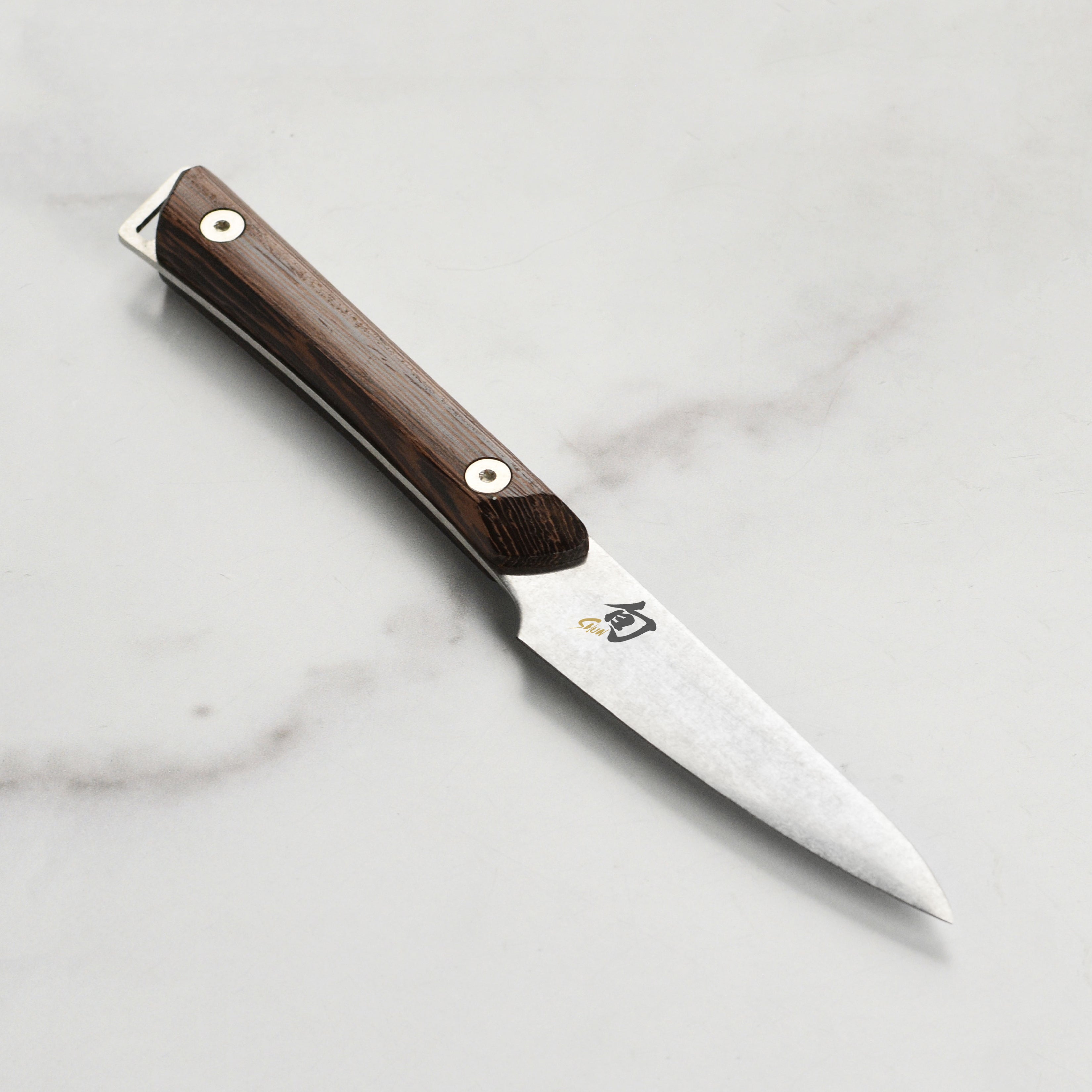 Japanese paring knife with rustic heritage finish, perfect for detailed kitchen tasks