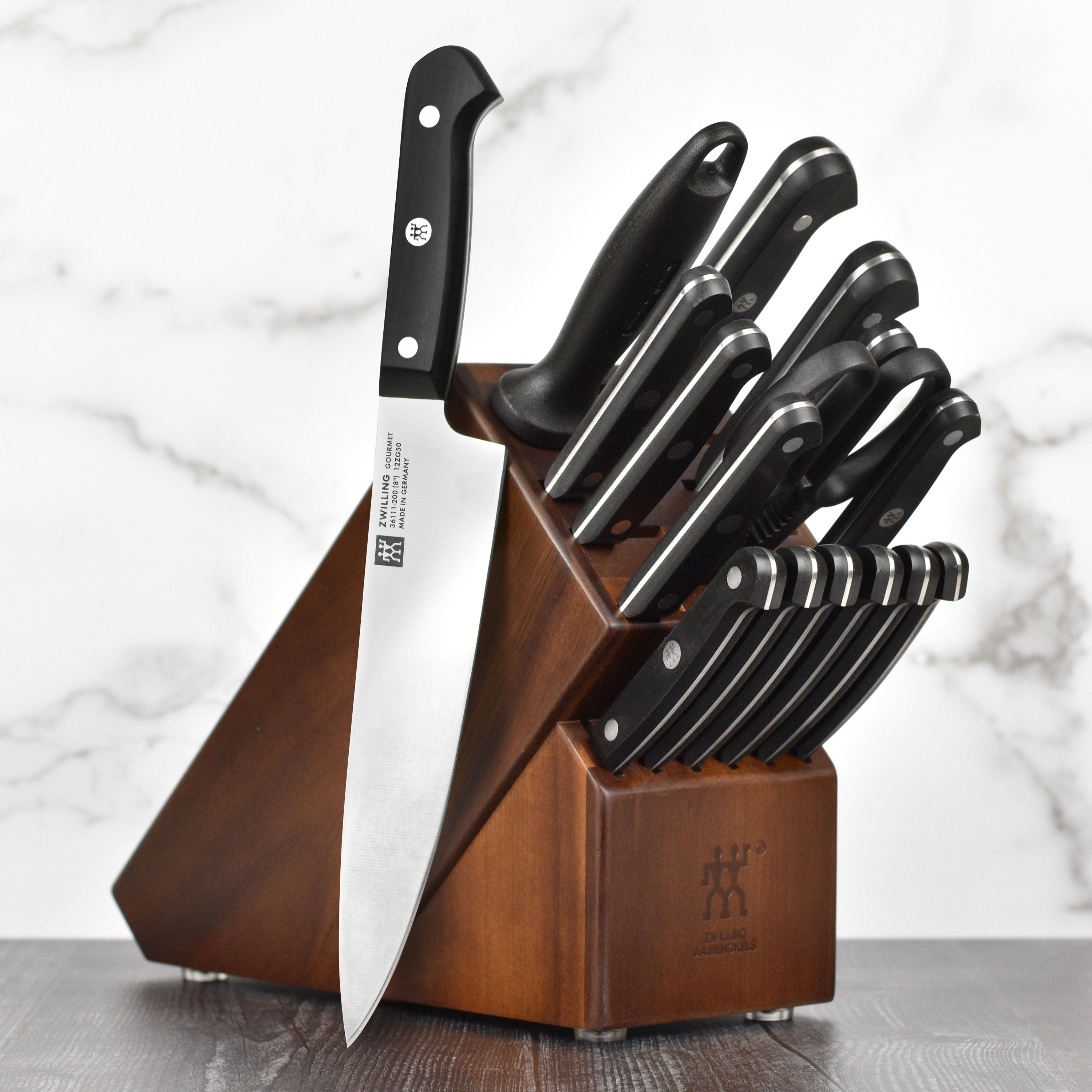 Zwilling Gourmet knife block set showing the high-carbon stainless steel blades and acacia wood block.
