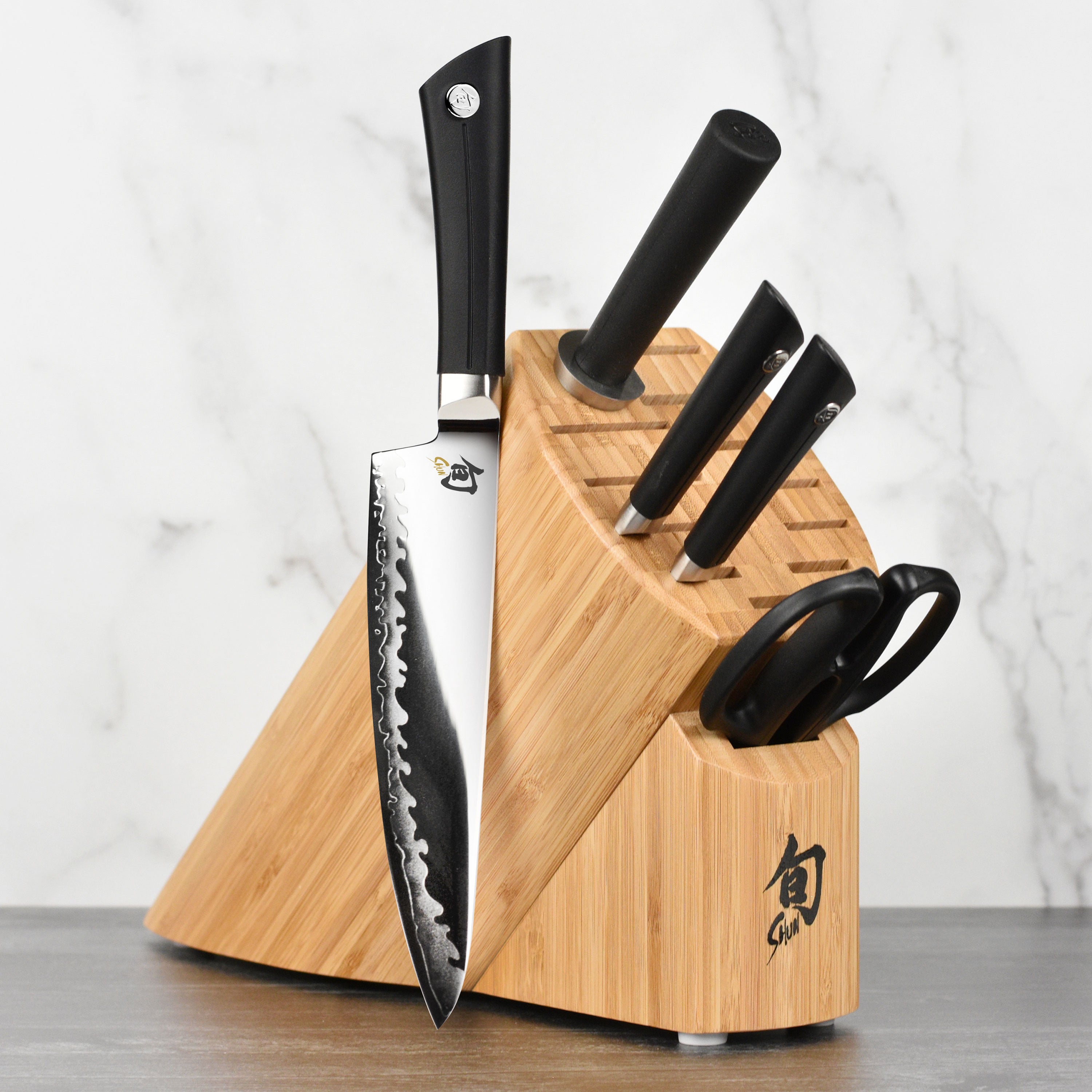 Sora Elite 6-Piece Knife Set displayed on a wooden countertop, showcasing the elegant design and craftsmanship.