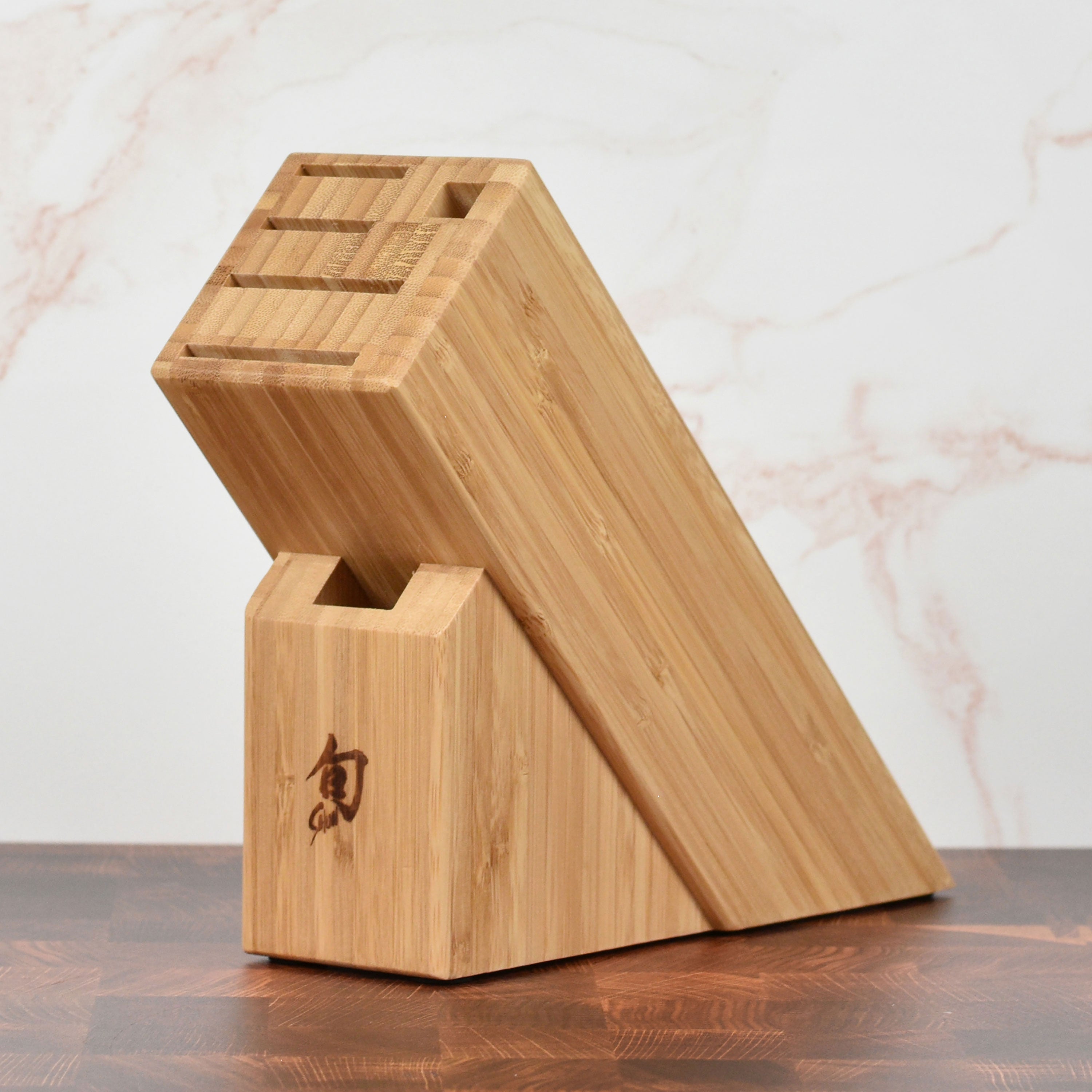 Close-up of Eco-Smart Bamboo Knife Block showing knife slots and design.