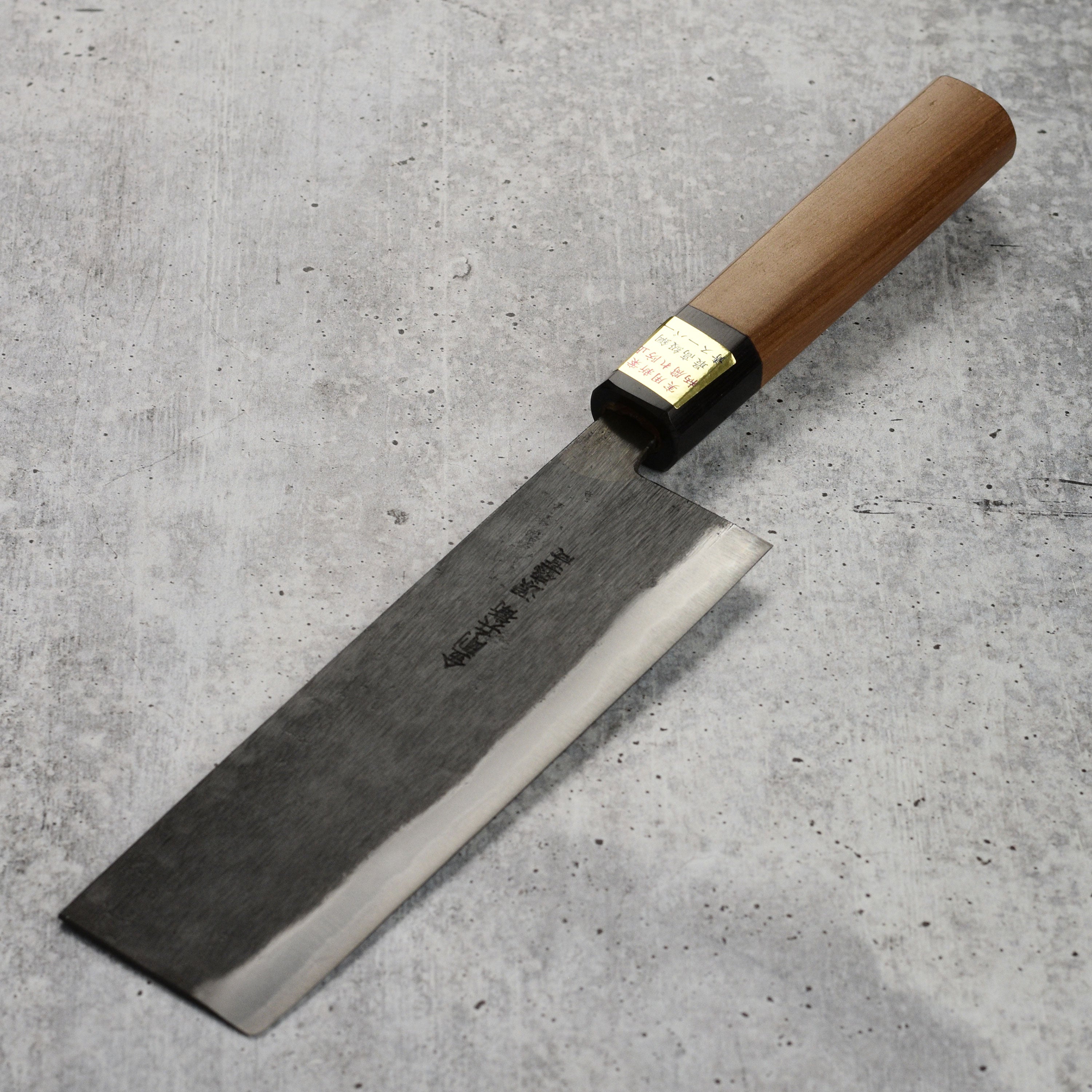 Close-up of the Moritaka Nakiri knife blade highlighting its sharp edge and craftsmanship.