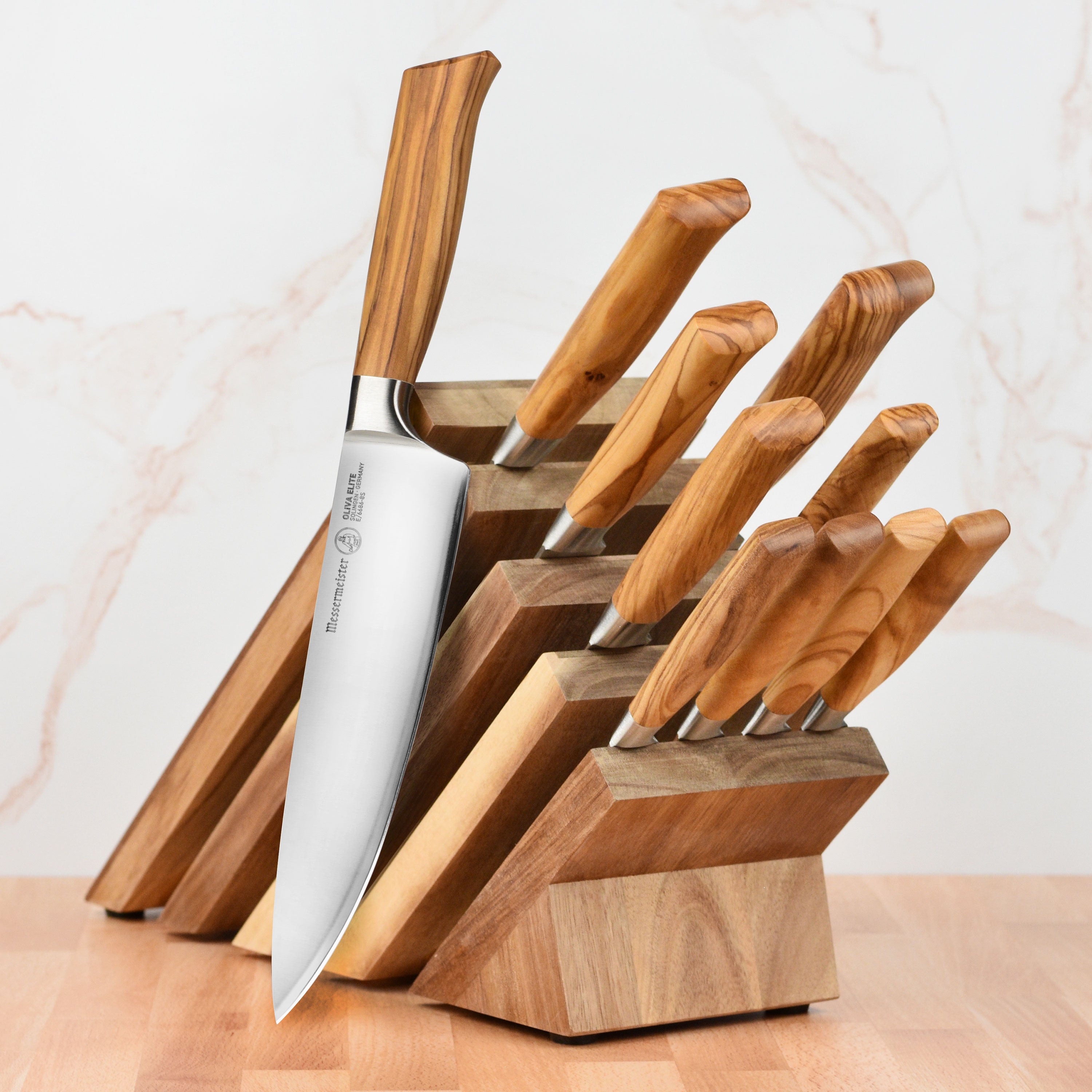 Olive Wood Elite knife set displaying ergonomic olive wood handles and magnetic block.