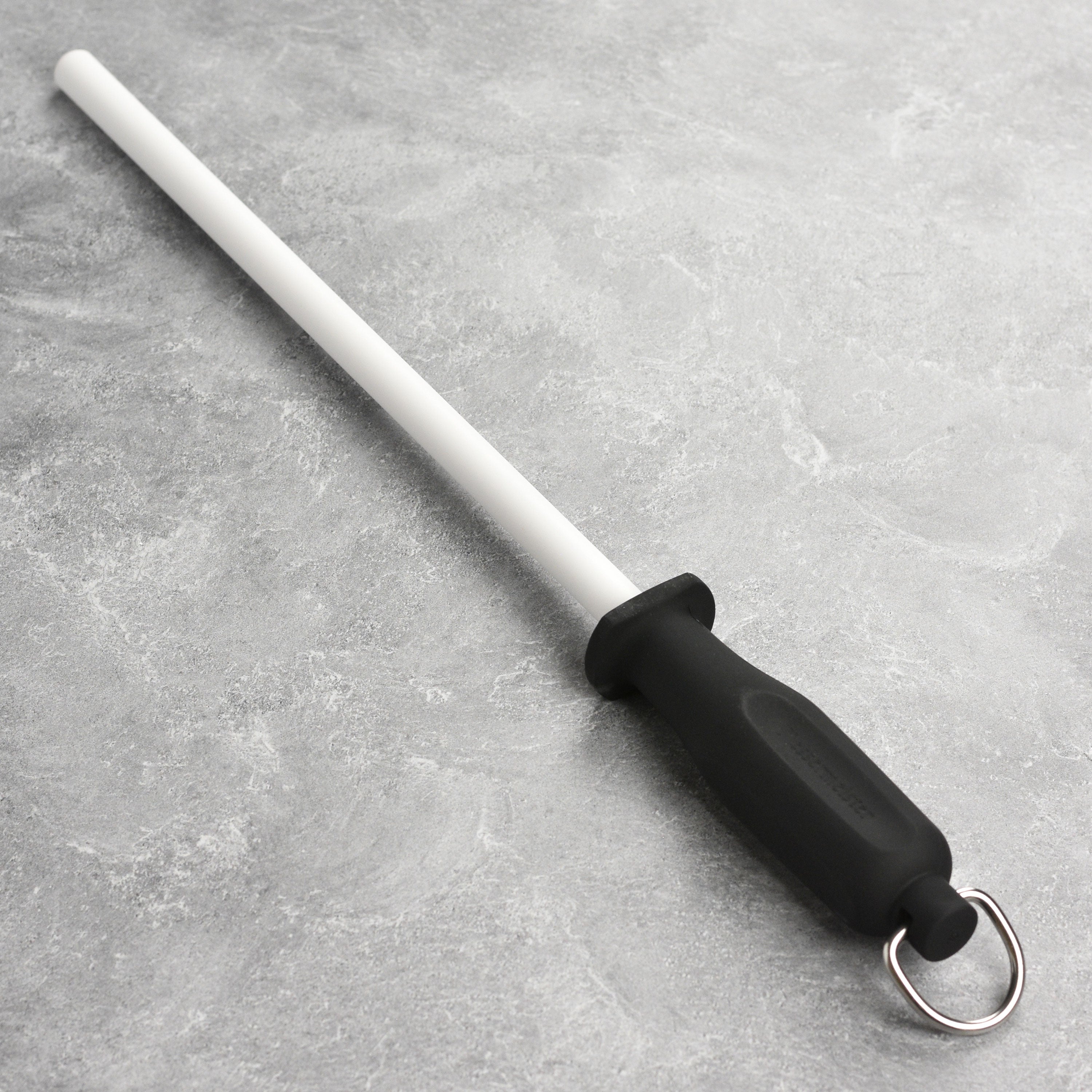 Precision Edge ceramic knife sharpener showcasing its ergonomic handle and fine 1200-grit surface.