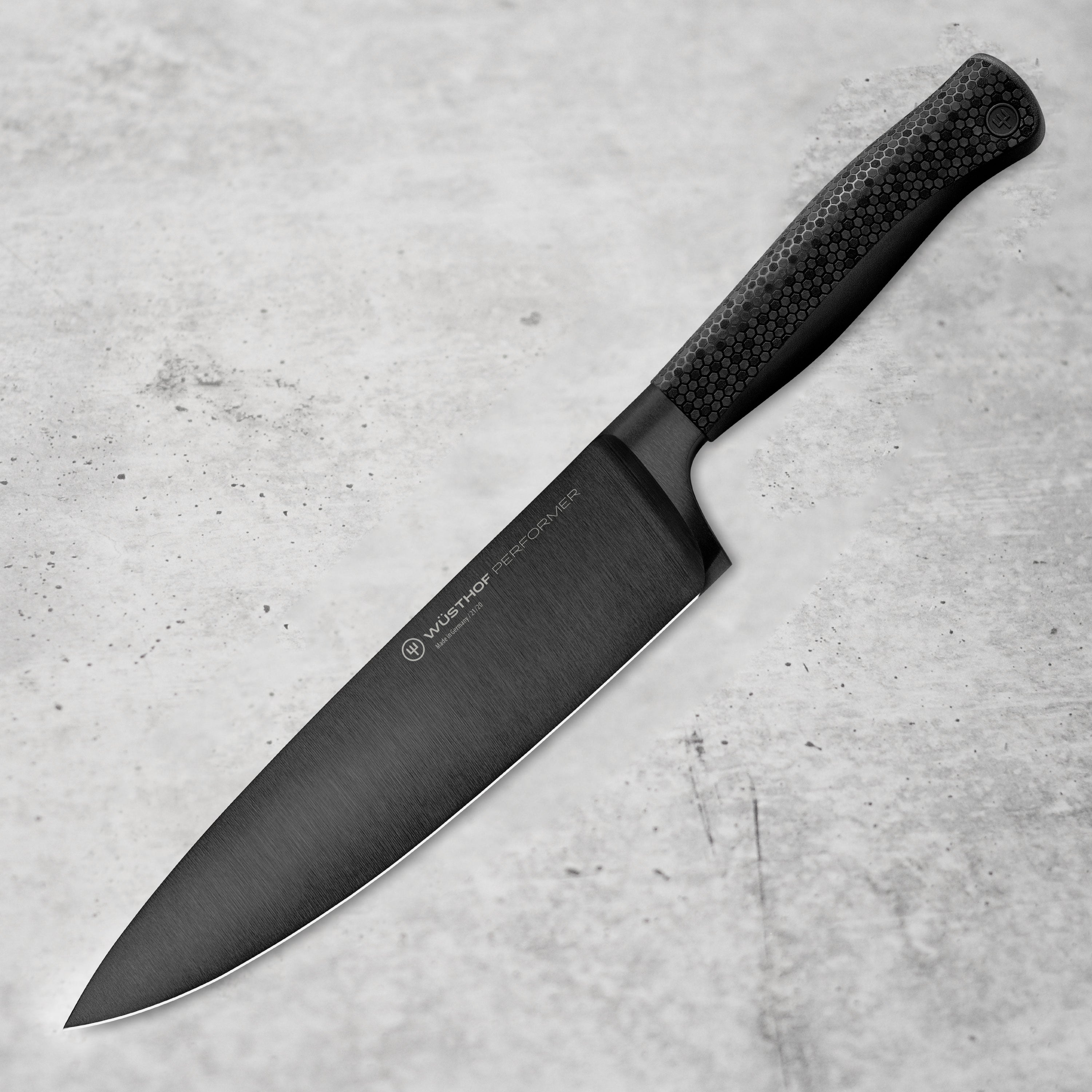 Wusthof 8 inch chef's knife angled view, highlighting the blade and handle design.