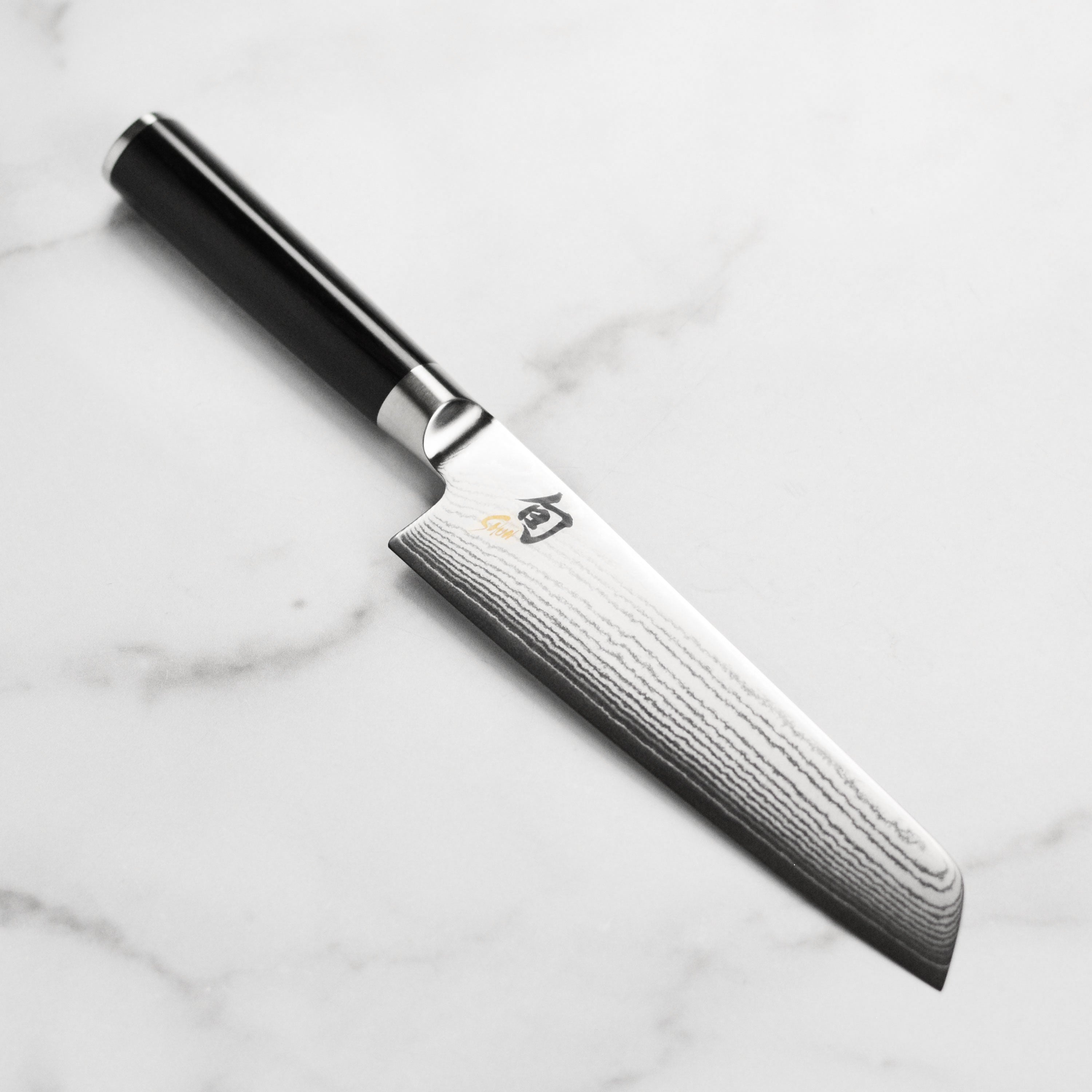 Shun Classic utility knife with Japanese blade and ebony handle for precise slicing