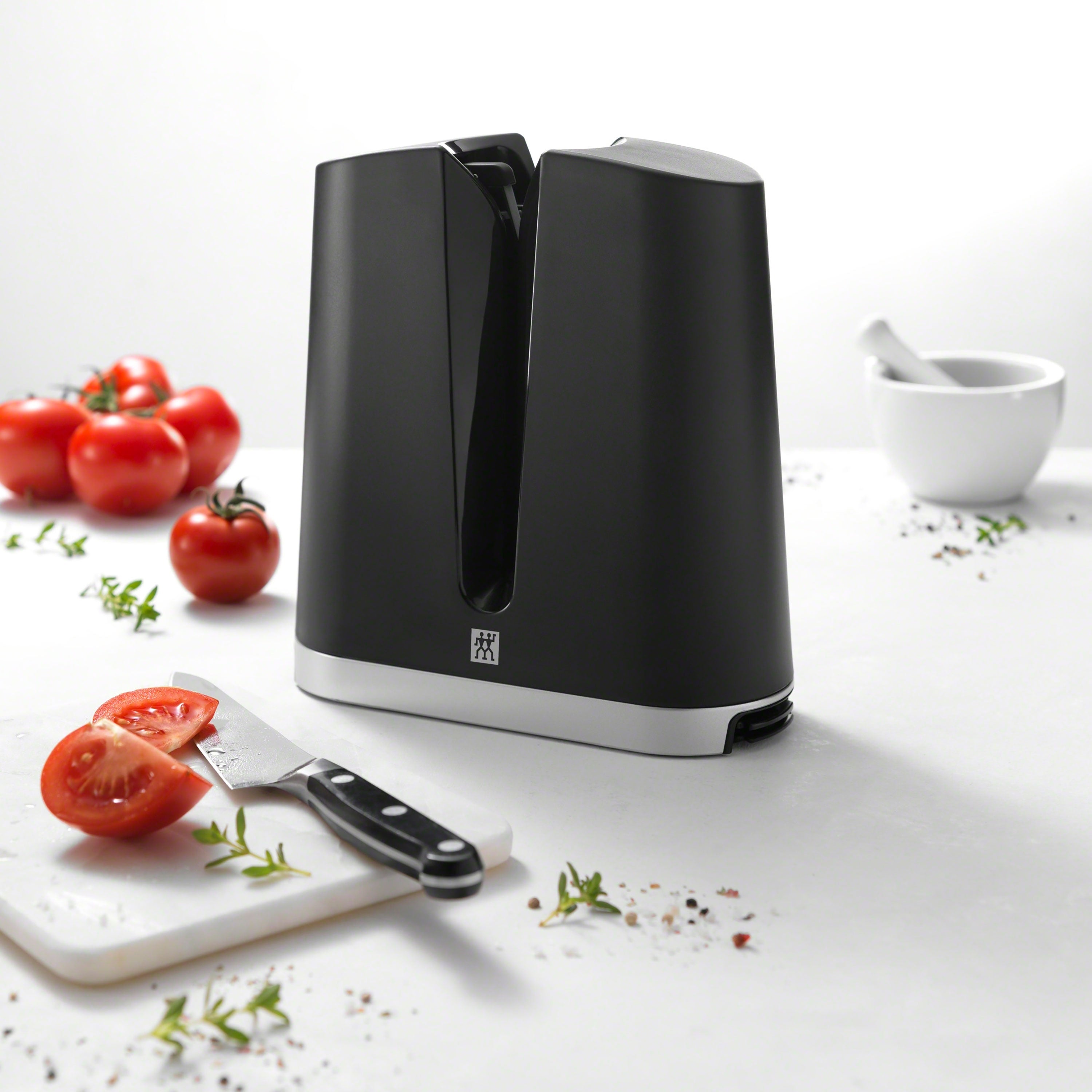 Close-up of Zwilling V-Edge professional blade sharpener with sharpening stones