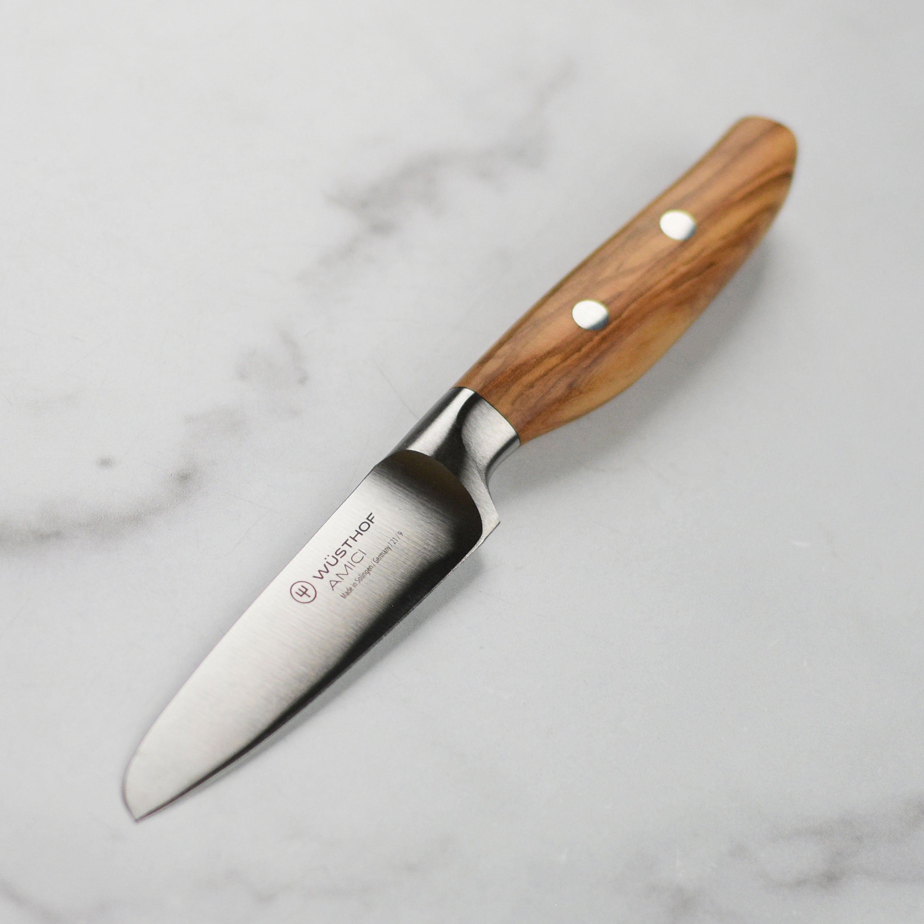 Wusthof Amici 3.5-inch olive wood paring knife with sharp blade and ergonomic handle
