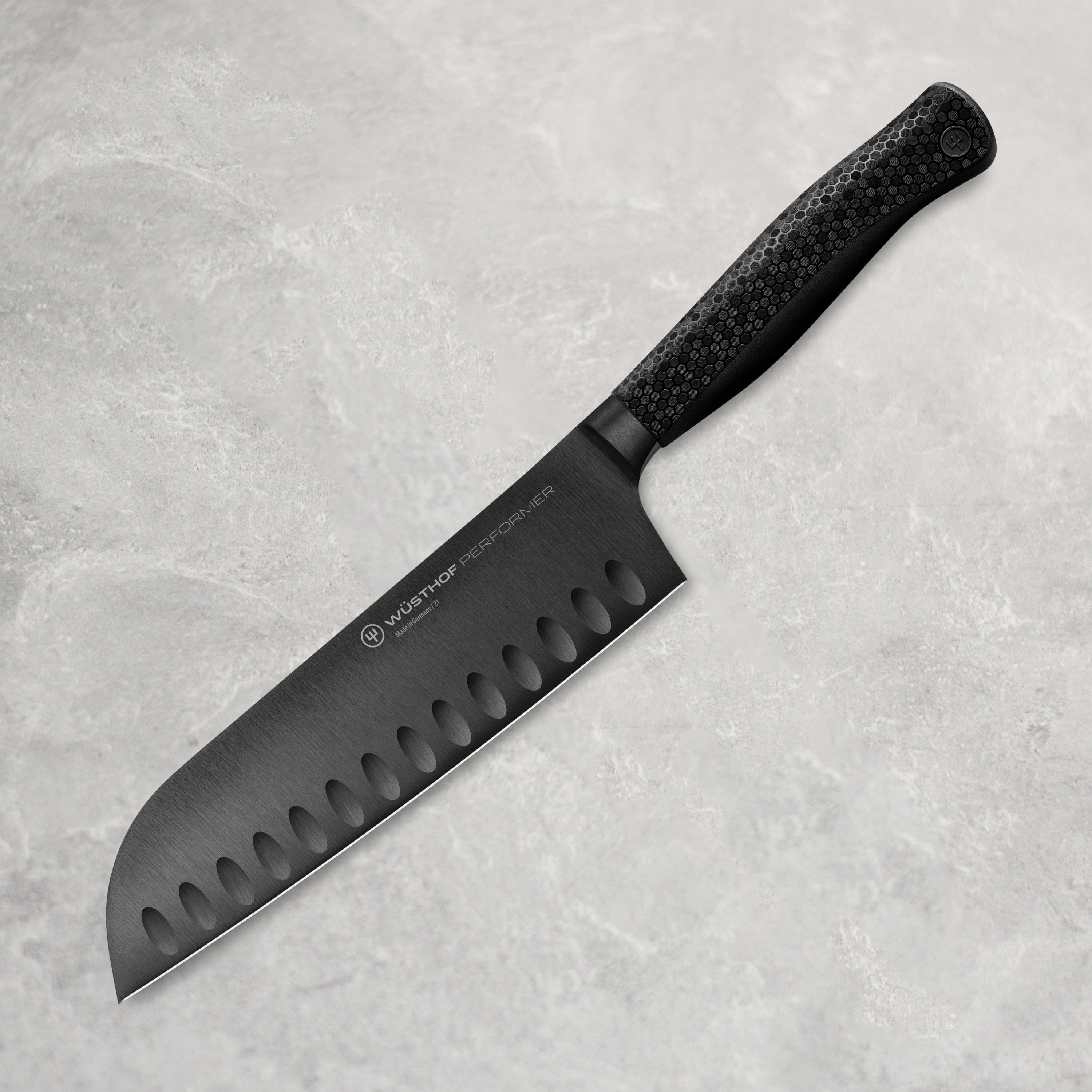 Wusthof Performer 7-inch hollow edge Santoku knife with sharp blade and ergonomic handle