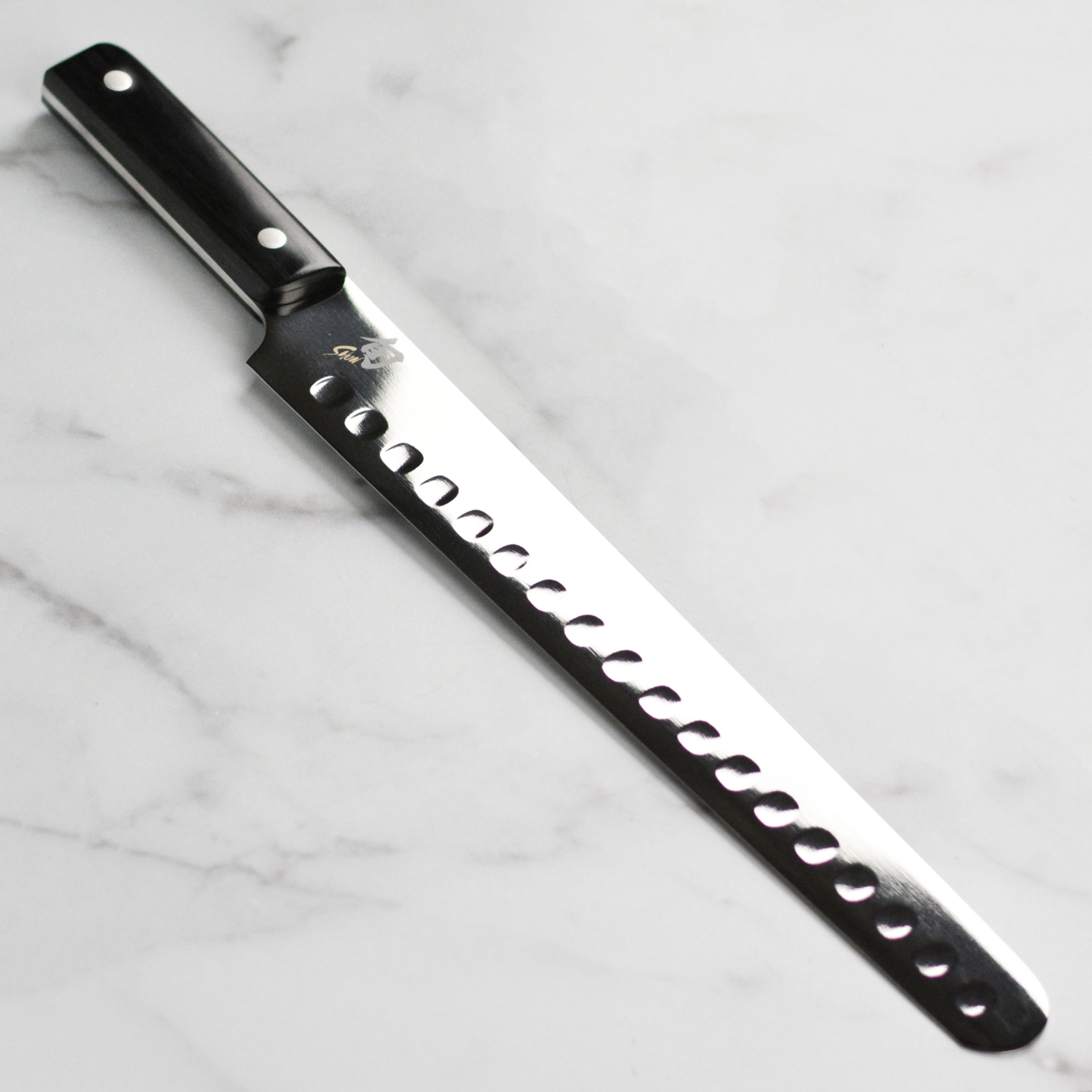 Seki Artisan 12-Inch Hollow Edge Brisket Knife showcasing the sleek double-bevel blade.