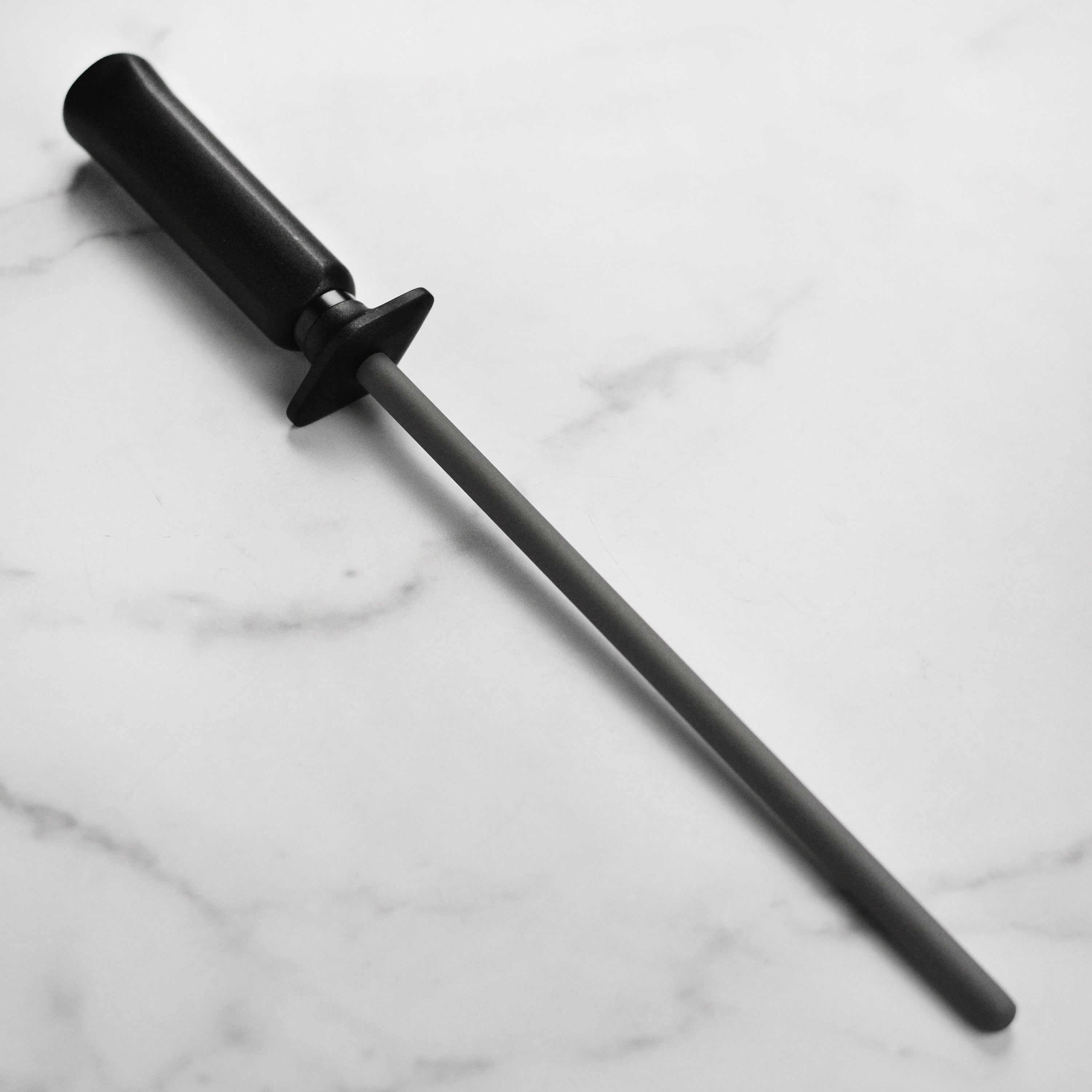Miyabi tungsten sharpening steel showcasing its durable design and traditional handle