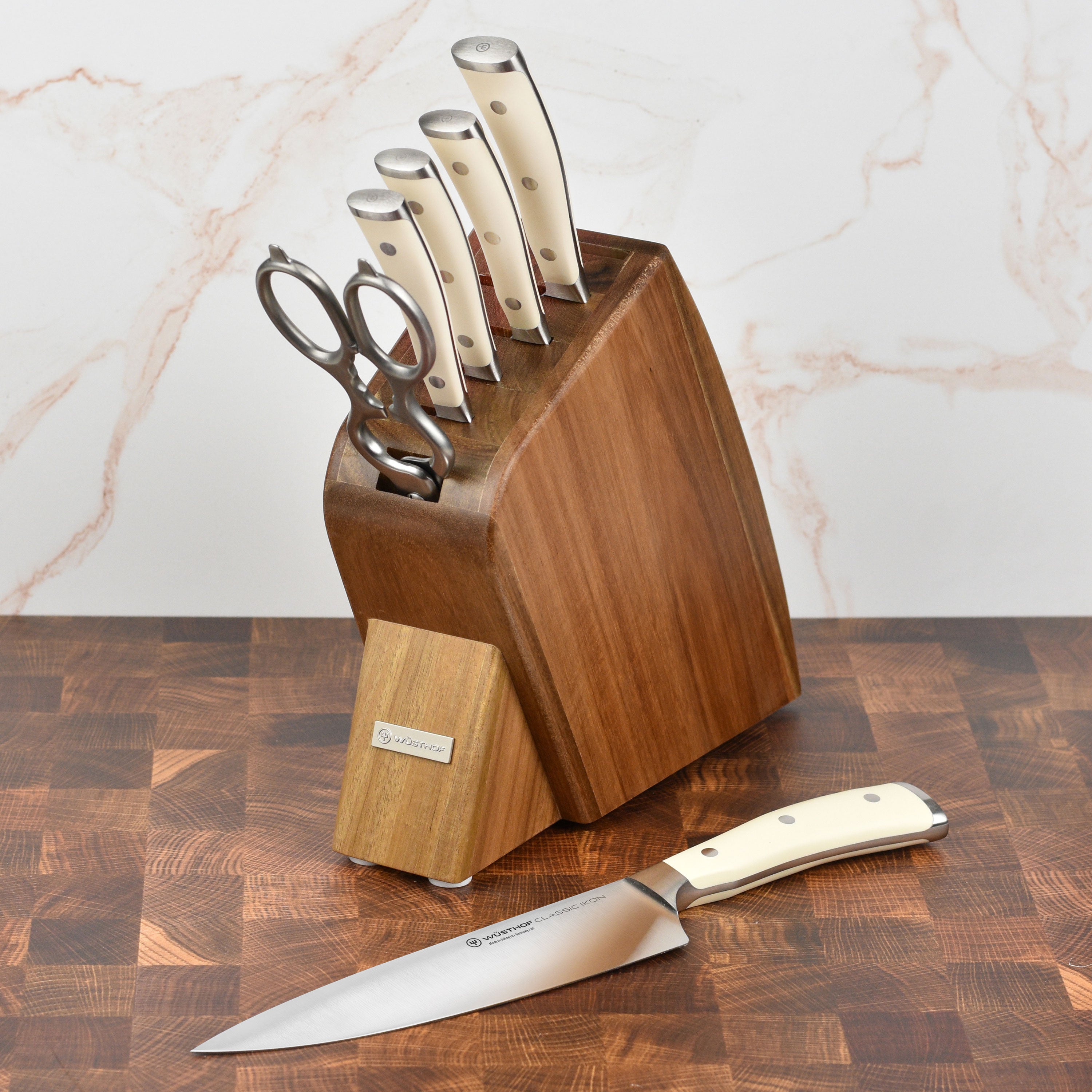Wusthof Classic Ikon knife block set displayed on a kitchen countertop, highlighting the elegant design and high-quality kitchen knives.